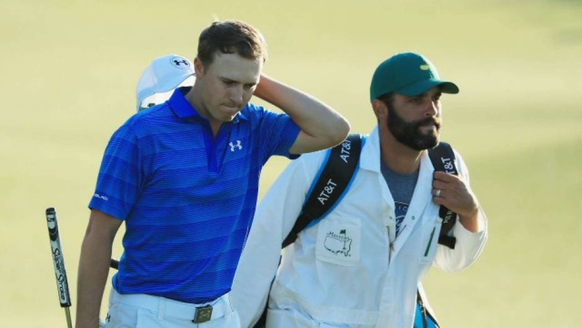 AUGUSTA, GA - APRIL 10: Jordan Spieth waits with his caddie Michael Greller on the 11th hole during the final round of the 2016 Masters Tournament at the Augusta National Golf Club on April 10, 2016 in Augusta, Georgia. (Photo by Scott Halleran/Getty Images for Golfweek) *** Local Caption *** Jordan Spieth
