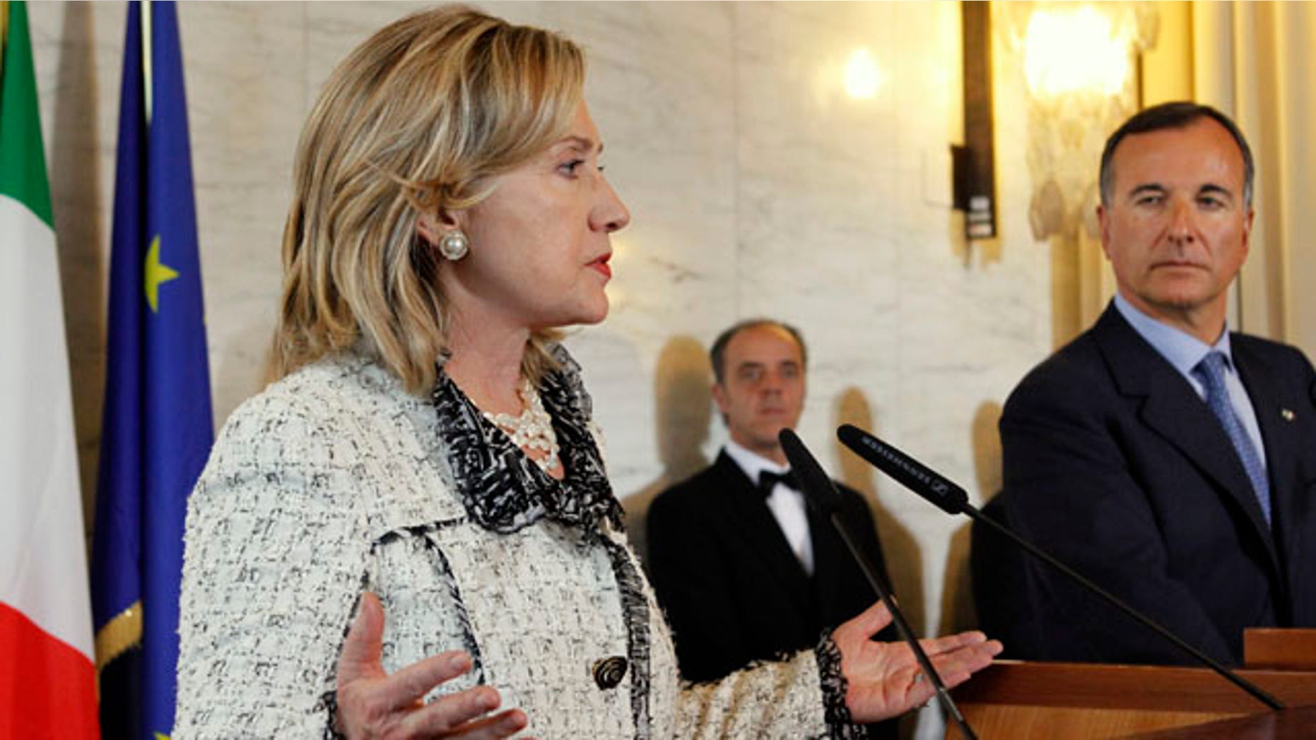 May 5: U.S. Secretary of State Hillary Rodham Clinton, left, speaks to the media with Italy's Foreign Minister Franco Frattini at the Ministry of Foreign Affairs during the Second Contact Group Meeting on Libya, in Rome.