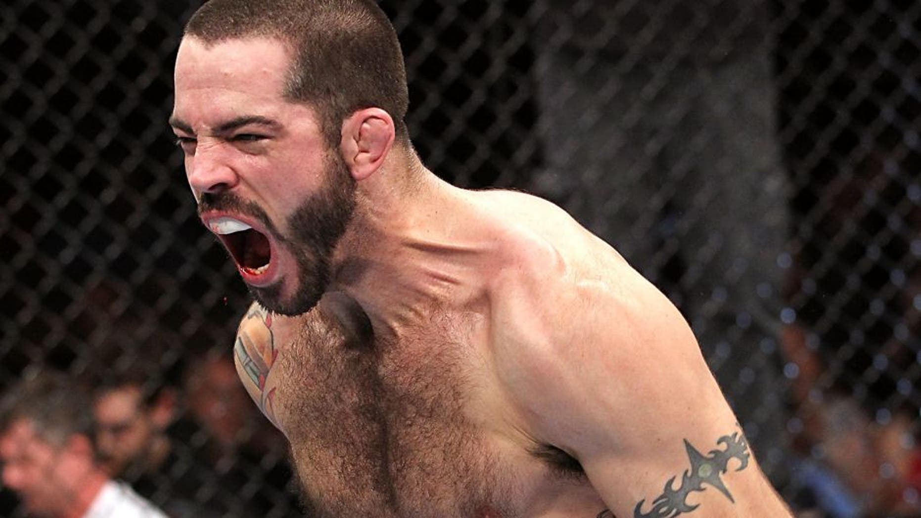 LAS VEGAS, NV - FEBRUARY 04: Matt Brown reacts after his knockout victory over Chris Cope during the UFC 143 event at Mandalay Bay Events Center on February 4, 2012 in Las Vegas, Nevada. (Photo by Nick Laham/Zuffa LLC/Zuffa LLC via Getty Images)