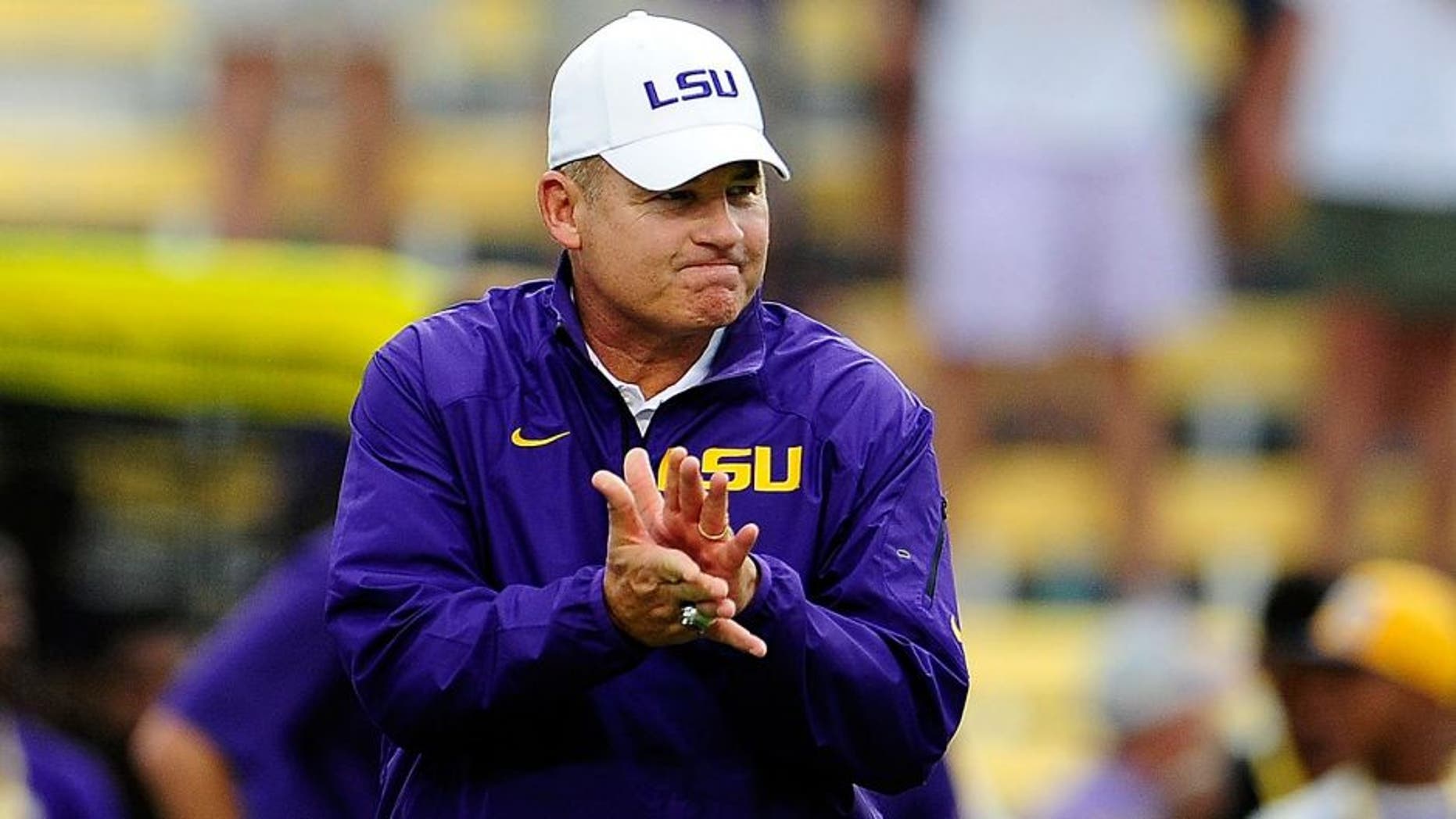 BATON ROUGE, LA - SEPTEMBER 07: Les Miles, head coach of the LSU Tigers, watches his team during warmups prior to a game at Tiger Stadium against the UAB Blazers on September 7, 2013 in Baton Rouge, Louisiana. LSU won the game 56-17. (Photo by Stacy Revere/Getty Images)