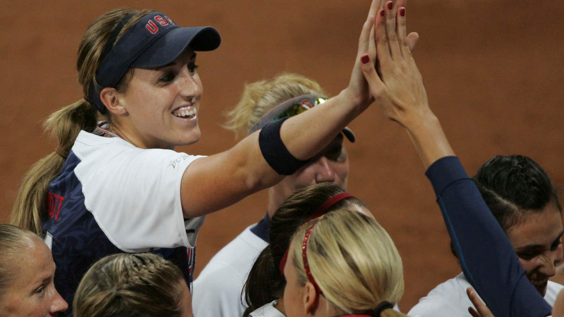 Aug. 17, 2008: Monica Abbott (L) of the U.S. celebrates after pitching a no-hitter against the Netherlands during their women's preliminaries softball game at the Beijing 2008 Olympic Games.