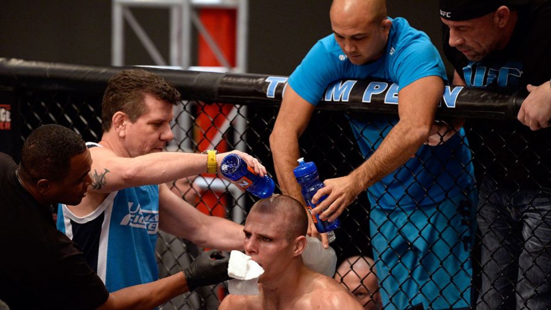 LAS VEGAS, NV - NOVEMBER 1: (R-L) Team Edgar fighter Dhiego Lima looks to strike team Penn fighter Tim Williams in their preliminary fight during filming of season nineteen of The Ultimate Fighter on November 1, 2013 in Las Vegas, Nevada. (Photo by Jeff Bottari/Zuffa LLC/Zuffa LLC via Getty Images) *** Local Caption *** Dhiego Lima; Tim Williams