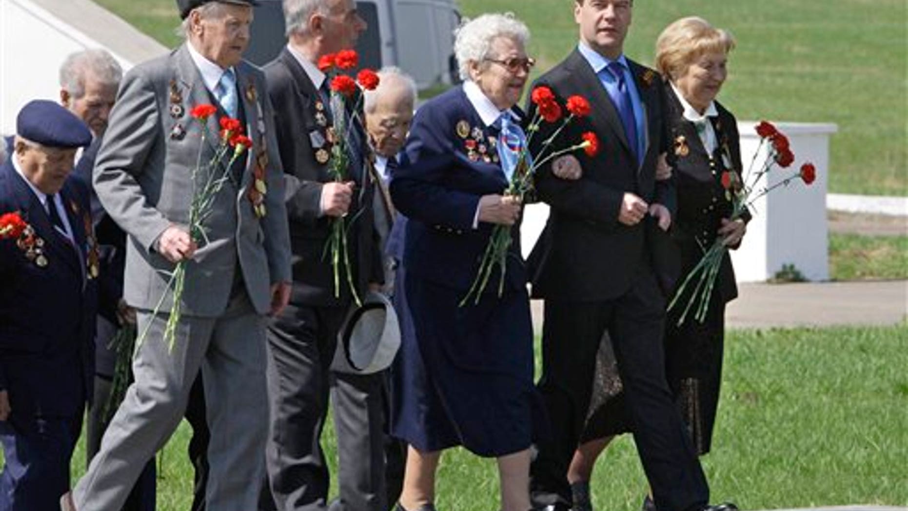 May 7: Russian President Dmitry Medvedev, second right, walks with World War II veterans to lay flowers at the monument to Soviet soldiers killed fighting Nazi troops in Nov. 1941, near Volokolamsk, 62.5 miles west of Moscow. Russia will celebrate its victory in WWII on May 9.