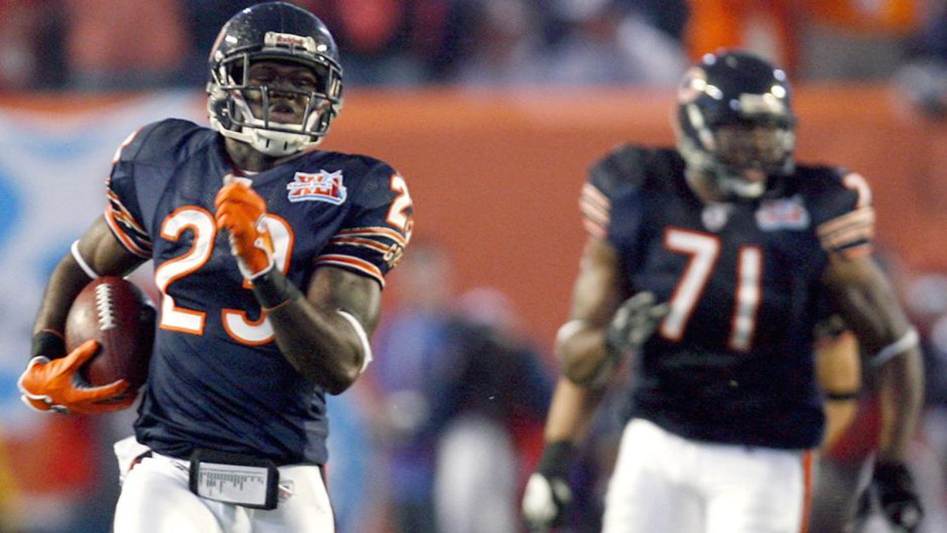 Devin Hester #23 and Israel Idonije #71 of the Chicago Bears during Super Bowl XLI between the Indianapolis Colts and Chicago Bears at Dolphins Stadium in Miami, Florida on February 4, 2007. (Photo by Kevin C. Cox/Getty Images)