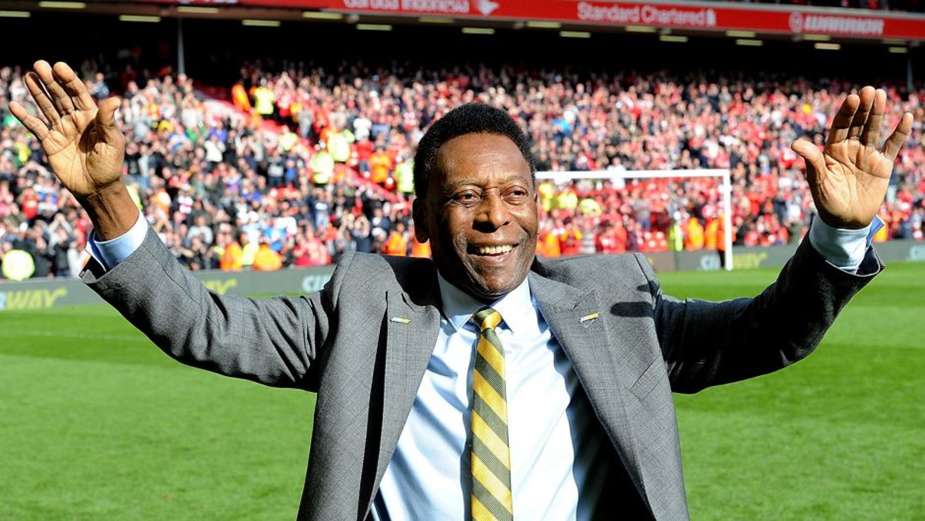 LIVERPOOL, ENGLAND - MARCH 22: (THE SUN OUT, THE SUN ON SUNDAY OUT) Pele comes onto the pitch at half time of the Barclays Premier League match between Liverpool and Manchester Untied at Anfield on March 22, 2015 in Liverpool, England. (Photo by John Powell/Liverpool FC via Getty Images)