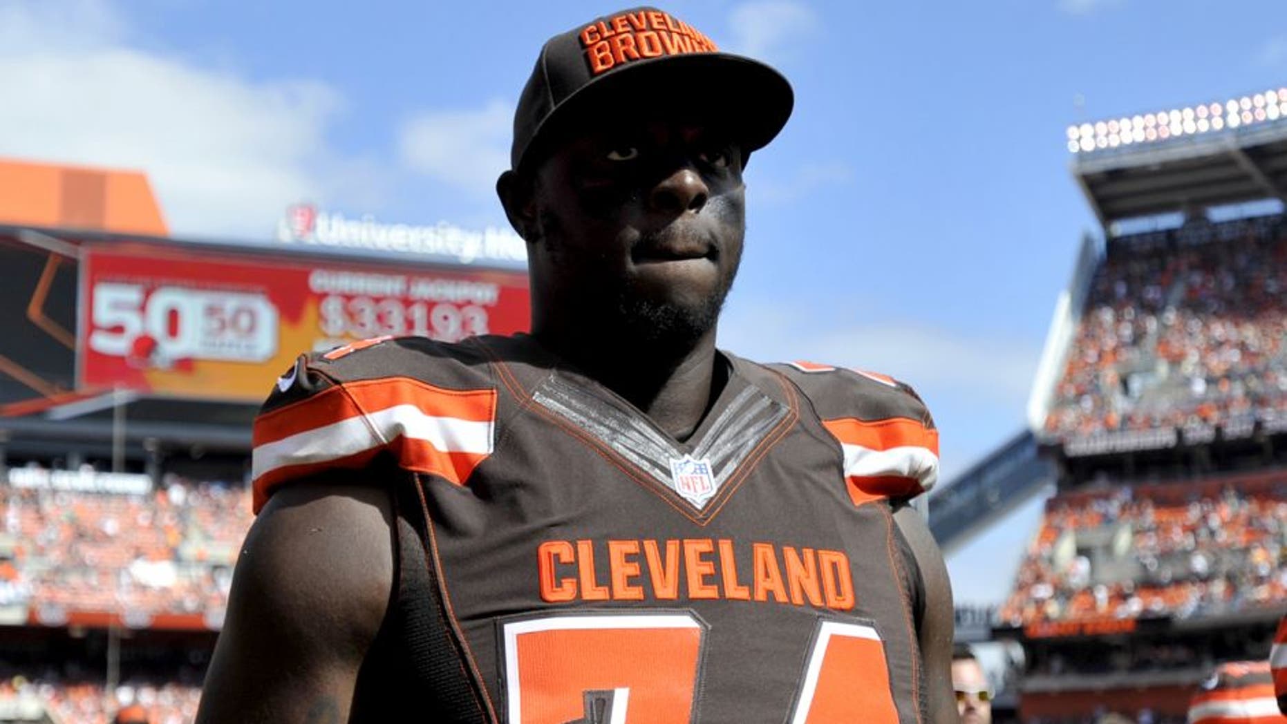 CLEVELAND, OH - SEPTEMBER 27, 2015: Offensive lineman Cameron Erving #74 of the Cleveland Browns walks off the field for halftime during a game against the Oakland Raiders on September 27, 2015 at FirstEnergy Stadium in Cleveland, Ohio. Cleveland won 28-14. (Photo by Nick Cammett/Diamond Images/Getty Images)
