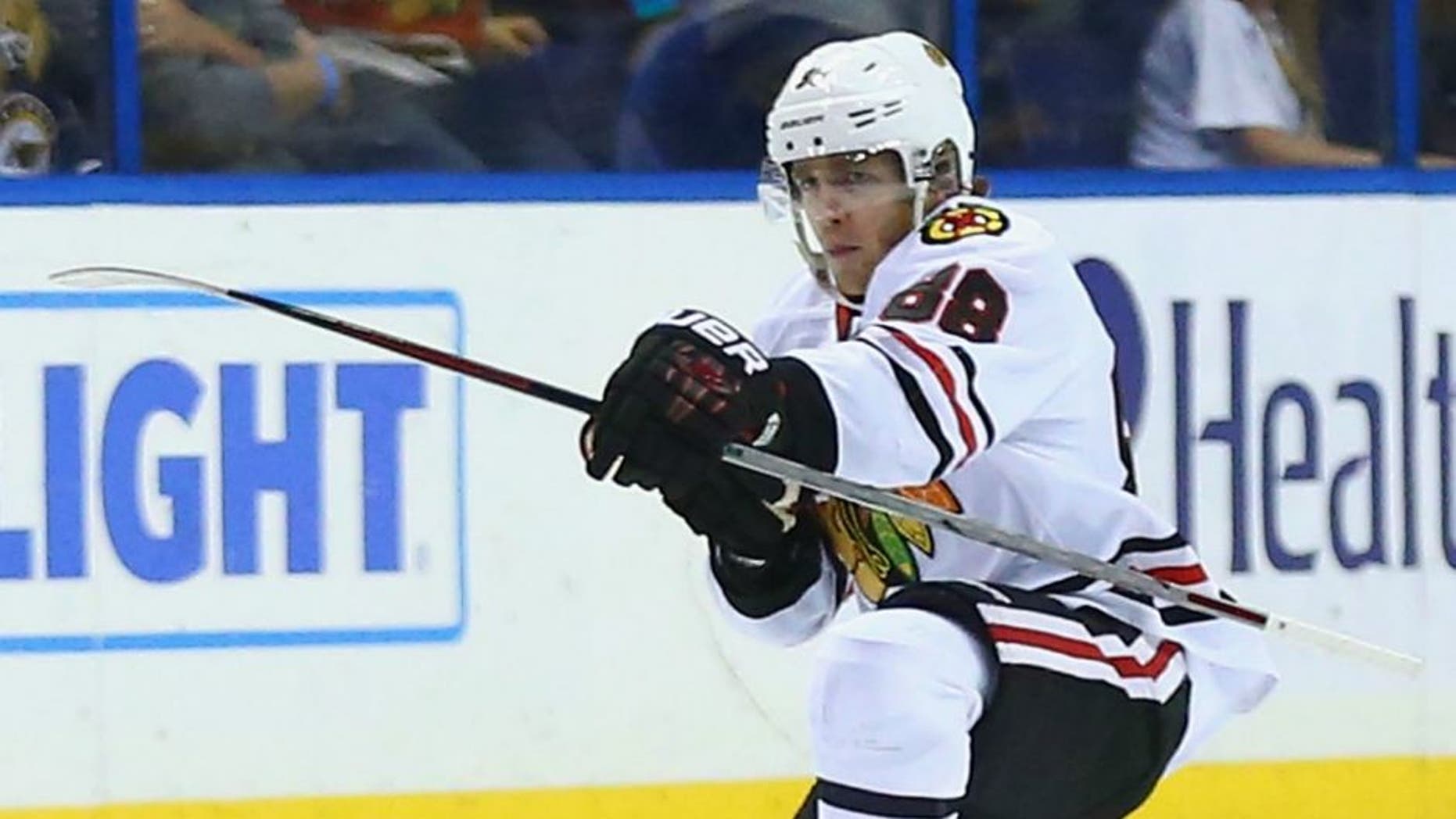 ST. LOUIS, MO - APRIL 21: Patrick Kane #88 of the Chicago Blackhawks celebrates after scoring the game-winning goal against the St. Louis Blues in Game Five of the Western Conference First Round during the 2016 NHL Stanley Cup Playoffs at the Scottrade Center on April 21, 2016 in St. Louis, Missouri. The Blackhawks beat the Blues 4-3 in double overtime. (Photo by Dilip Vishwanat/ Getty Images)