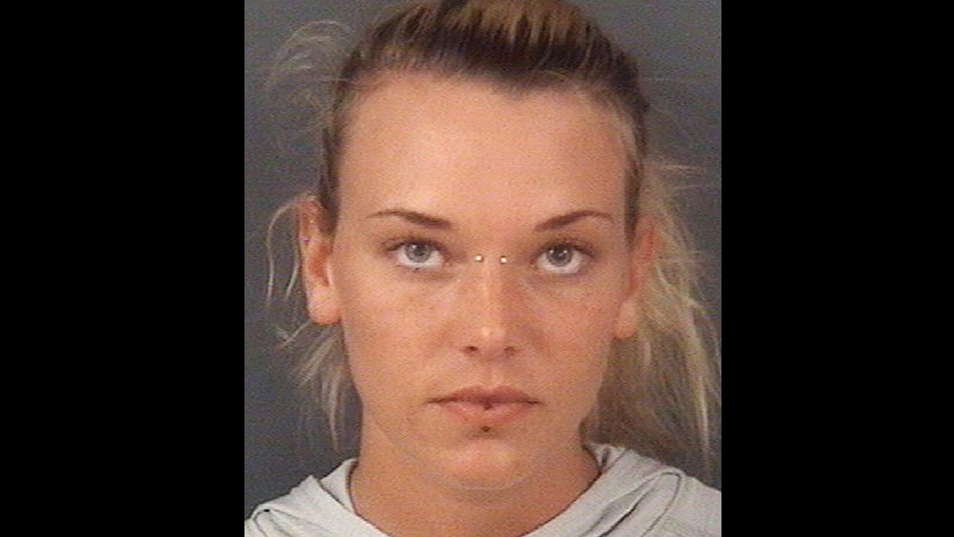 In this undated photo released by the Cumberland County Sheriff's Office, in Fayetteville, N.C., Marinna Rollins, poses for a photo.