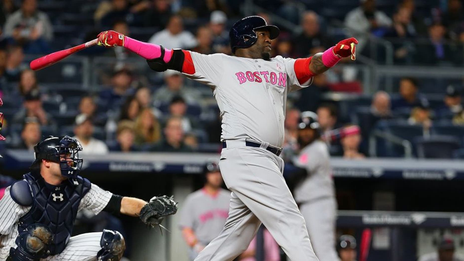 NEW YORK, NY - MAY 08: David Ortiz #34 of the Boston Red Sox connects on a solo home run in the fourth inning against the New York Yankees at Yankee Stadium on May 8, 2016 in the Bronx borough of New York City. (Photo by Mike Stobe/Getty Images)