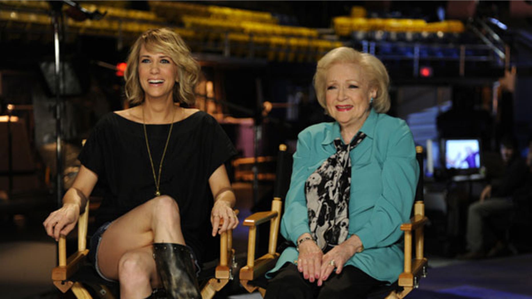 May 4: In this publicity image released by NBC, cast member Kristen Wiig,left, and Betty White are shown on the set of "Saturday Night Live."