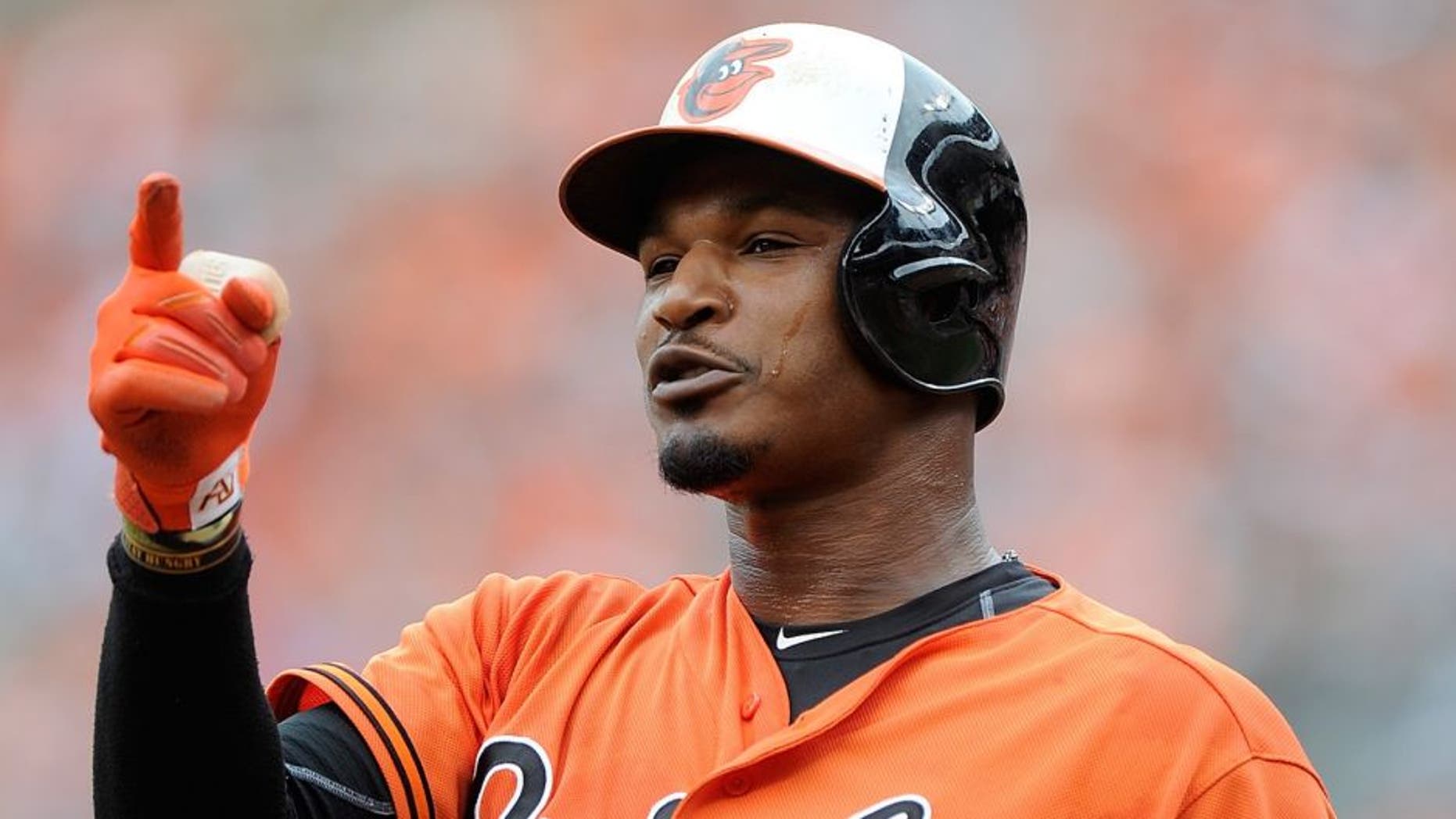 BALTIMORE, MD - JUNE 28: Adam Jones #10 of the Baltimore Orioles reacts after fouling out against the Cleveland Indians at Oriole Park at Camden Yards on June 28, 2015 in Baltimore, Maryland. (Photo by G Fiume/Getty Images)