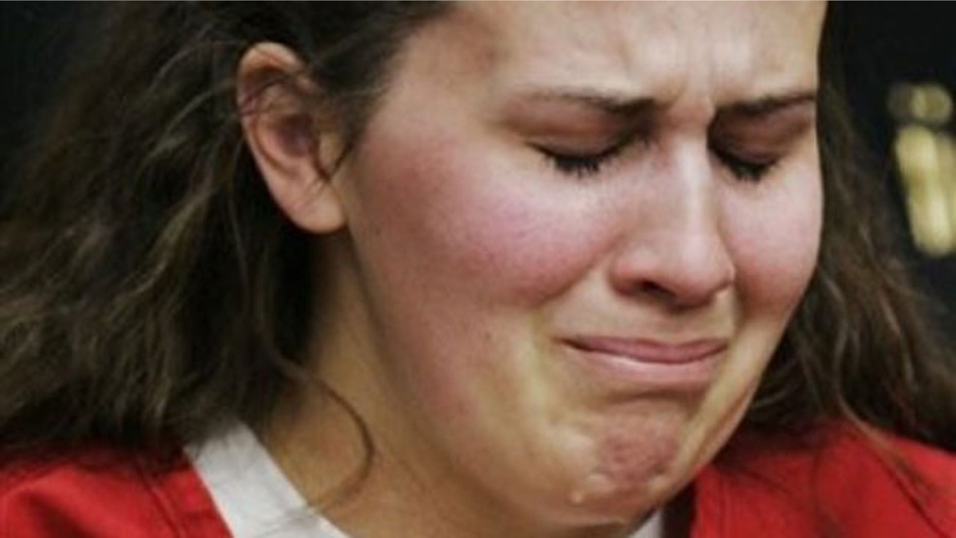In this April 14, 2009 file photo, Melissa Huckaby, 28, listens in a Stockton, Calif., courtroom during her arraignment. The Tracy Sunday school teacher has been sentenced to life in prison for kidnapping and murdering her 8-year-old neighbor.