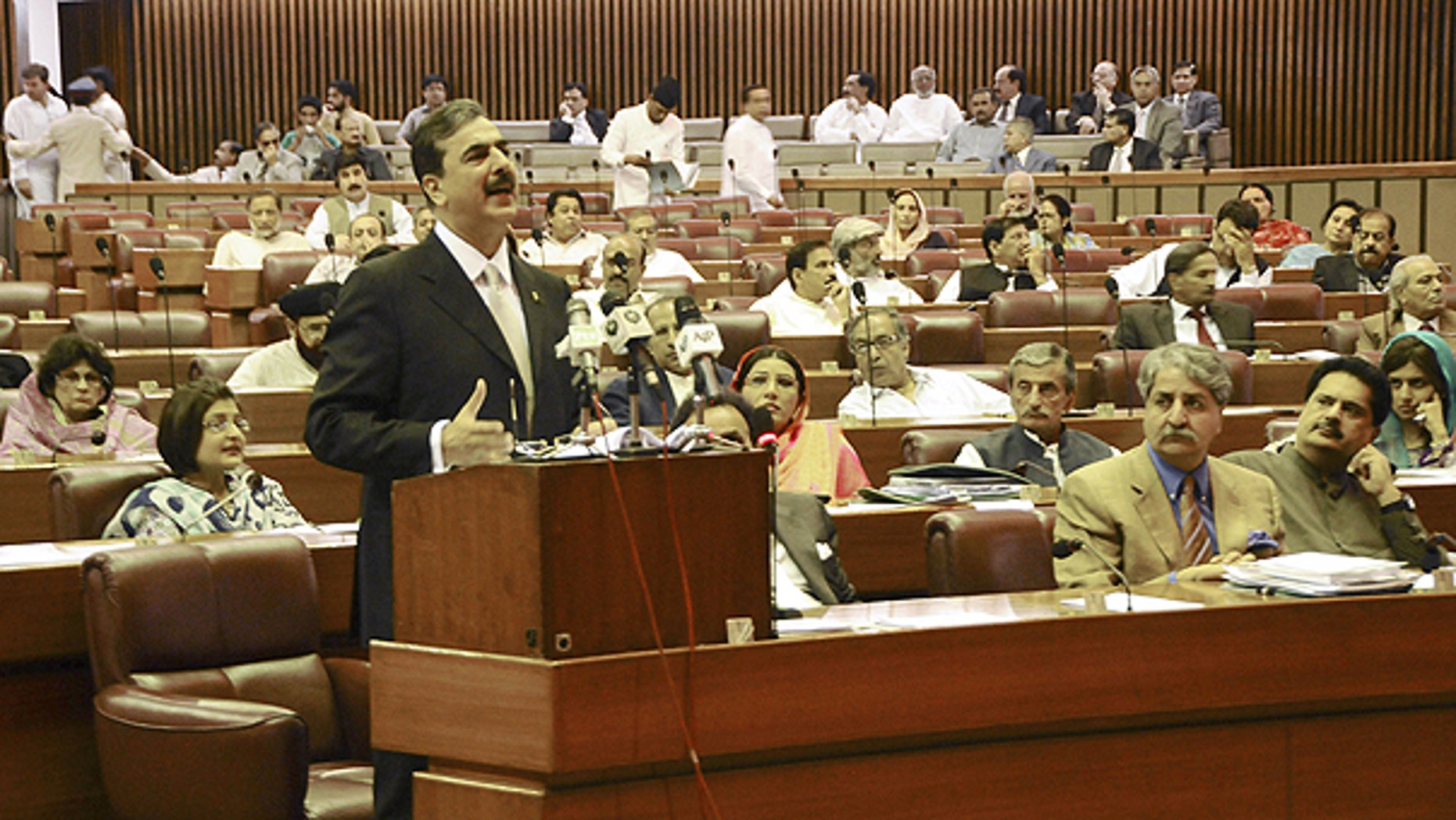 May 9: In this photo released by Pakistan's Press Information Department, Pakistani Prime Minister Yousuf Raza Gilani delivers a speech at the parliament house in Islamabad, Pakistan.