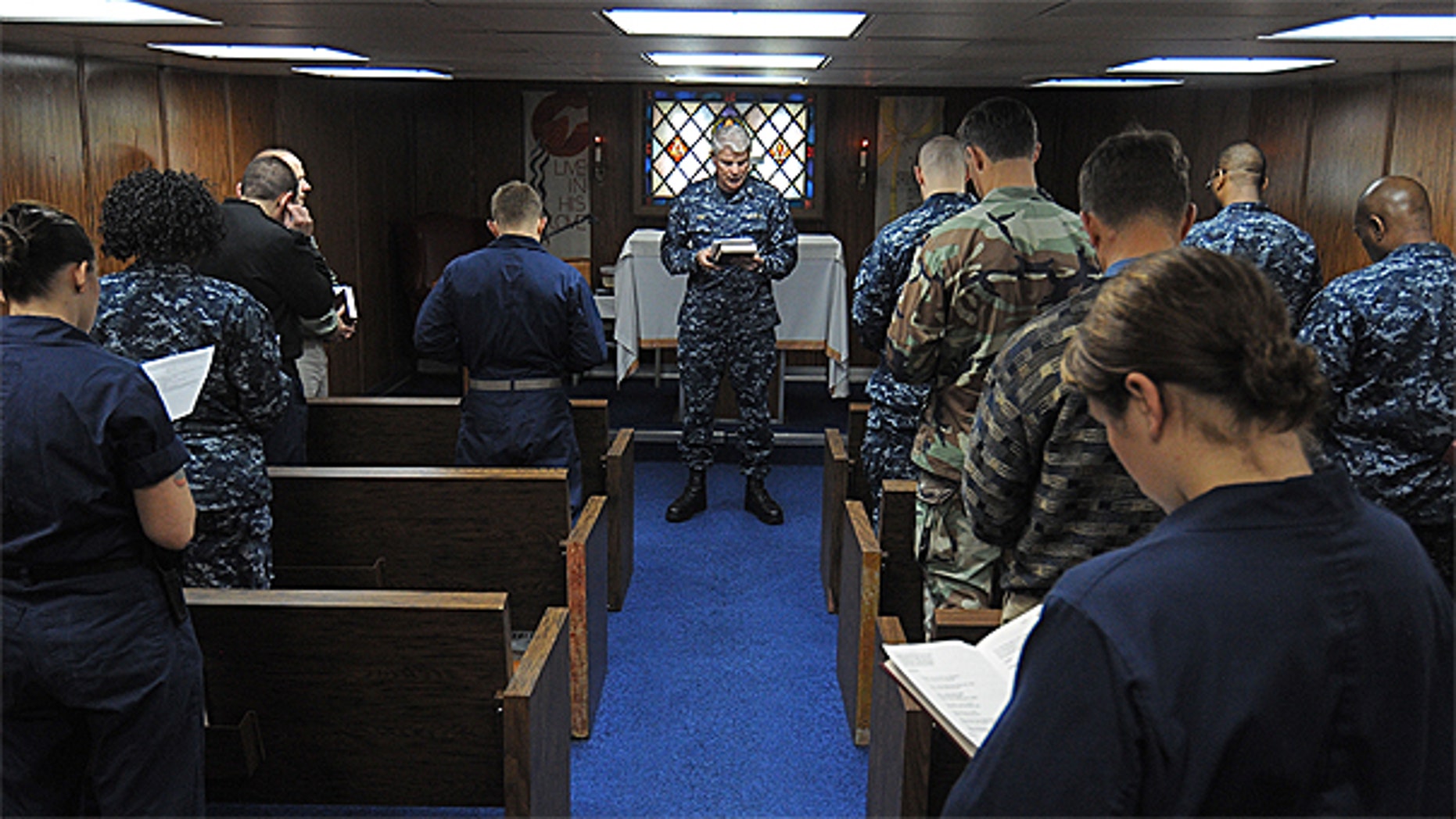 Jan. 30: Capt. Stephen Pike, chaplain of Commander, U.S. Naval Forces Europe-Africa/U.S. 6th Fleet, leads Sailors and embarked staff in prayer aboard the amphibious command ship USS Mount Whitney.