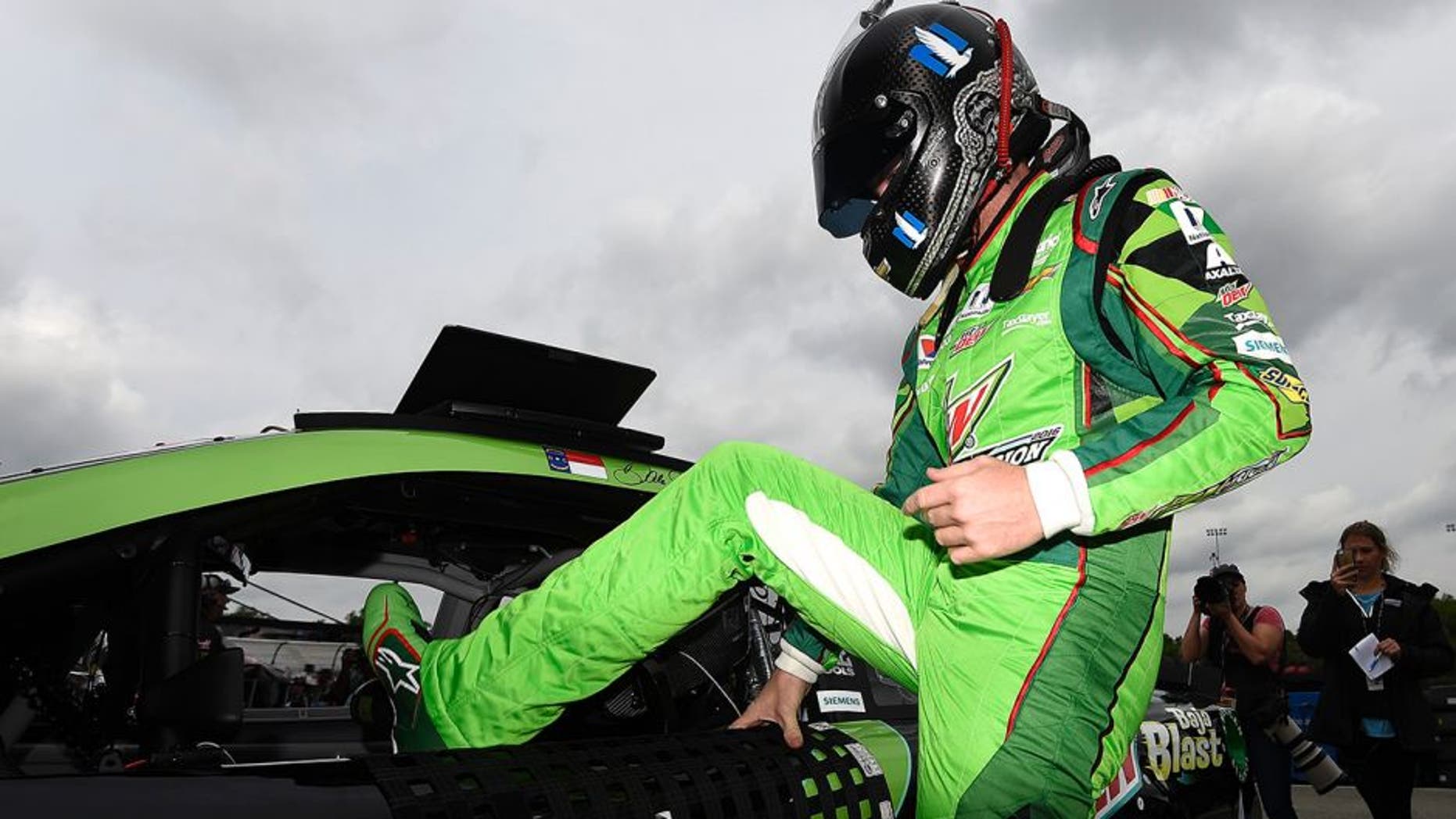 RICHMOND, VA - APRIL 22: Dale Earnhardt Jr., driver of the #88 Mountain Dew Chevrolet, climbs into his car during practice for the NASCAR Sprint Cup Series TOYOTA OWNERS 400 at Richmond International Raceway on April 22, 2016 in Richmond, Virginia. (Photo by Rainier Ehrhardt/Getty Images)