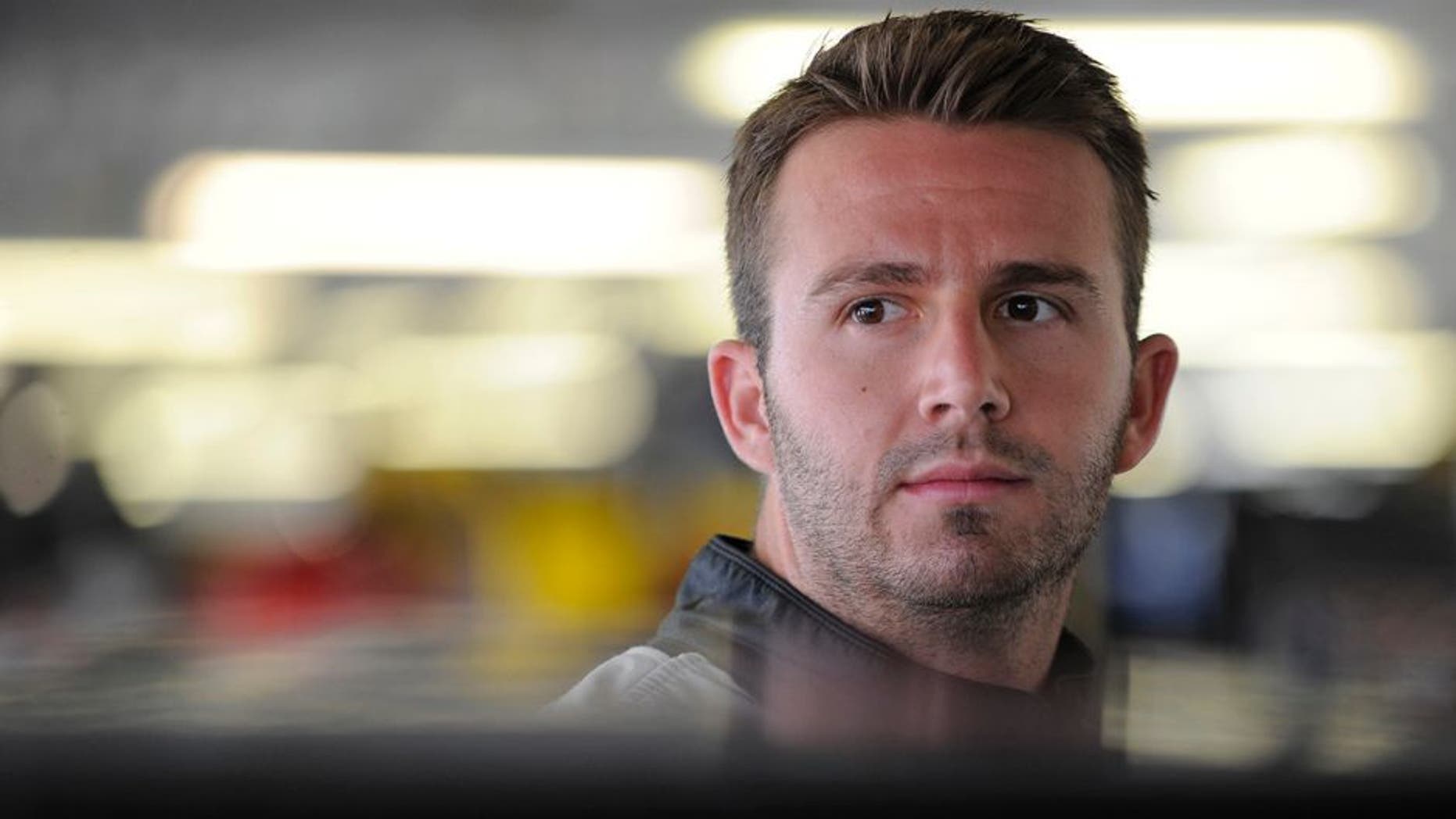 KANSAS CITY, KS - MAY 06: Matt DiBenedetto, driver of the #83 Cosmo Motors Toyota, looks on during practice for the NASCAR Sprint Cup Series Go Bowling 400 at Kansas Speedway on May 6, 2016 in Kansas City, Kansas. (Photo by Ed Zurga/Getty Images)