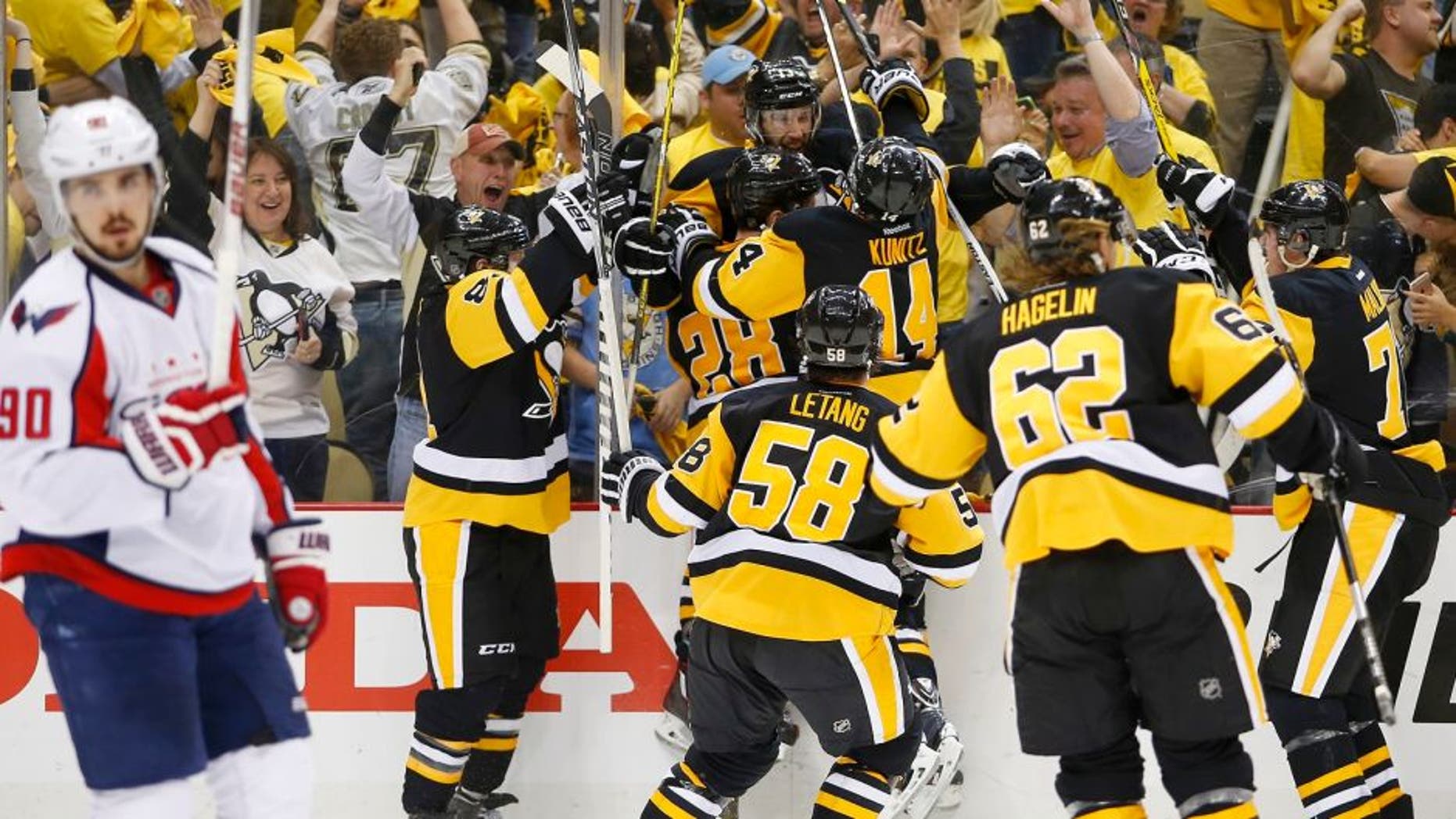 PITTSBURGH, PA - MAY 10: Nick Bonino #13 of the Pittsburgh Penguins celebrates his game winning overtime goal against the Washington Capitals in Game Six of the Eastern Conference Second Round during the 2016 NHL Stanley Cup Playoffs at Consol Energy Center on May 10, 2016 in Pittsburgh, Pennsylvania. (Photo by Justin K. Aller/Getty Images)