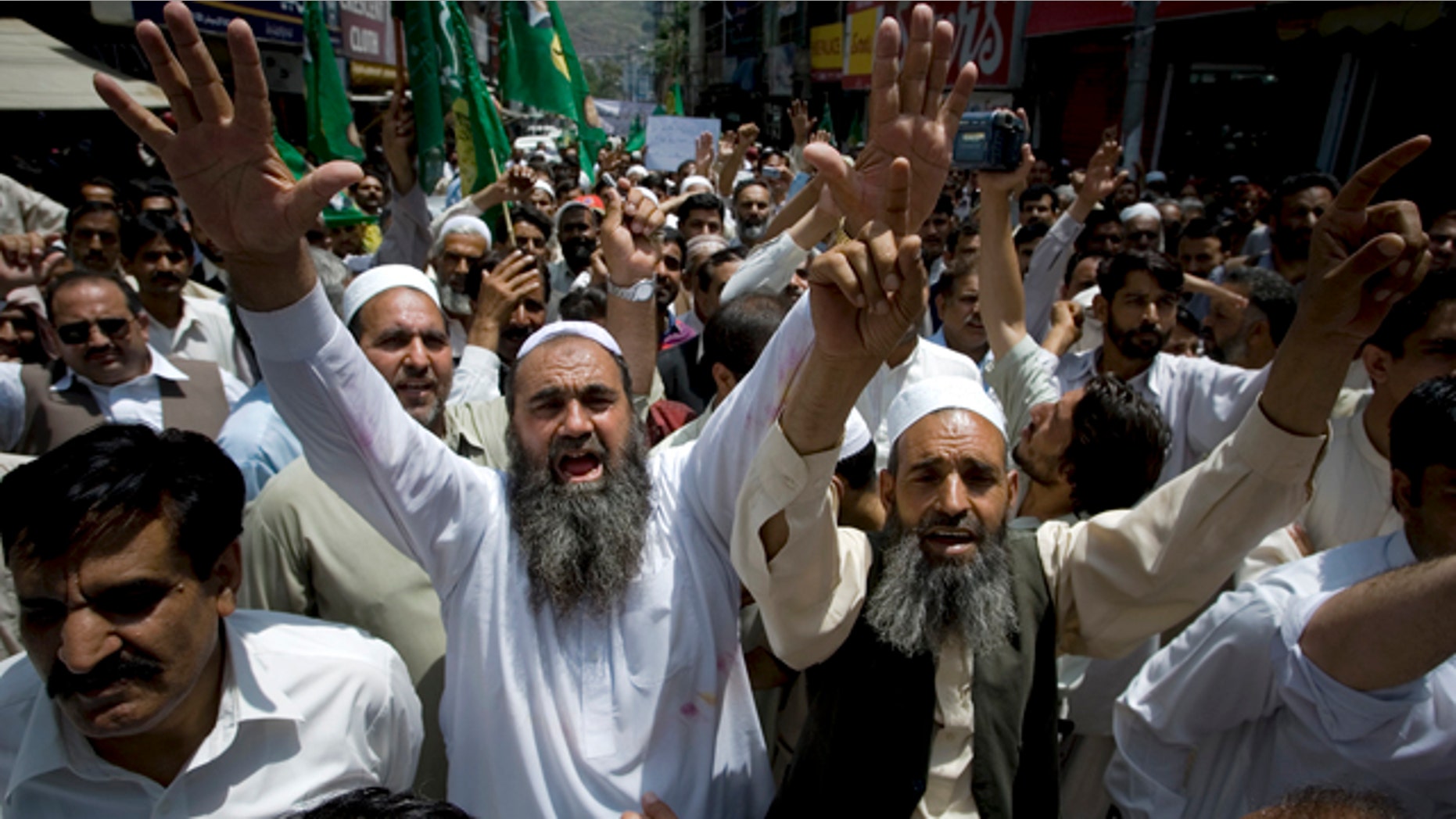May 12: Supporters of Pakistan Muslim League-N party chant slogans during an anti-U.S. rally in Abbottabad, Pakistan.