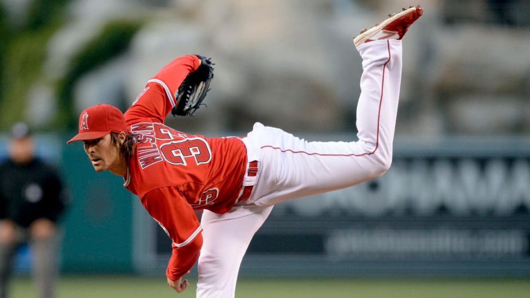 May 12, 2015; Anaheim, CA, USA; Los Angeles Angels starting pitcher C.J. Wilson (33) pitches against the Colorado Rockies during the second inning at Angel Stadium of Anaheim. Mandatory Credit: Kelvin Kuo-USA TODAY Sports