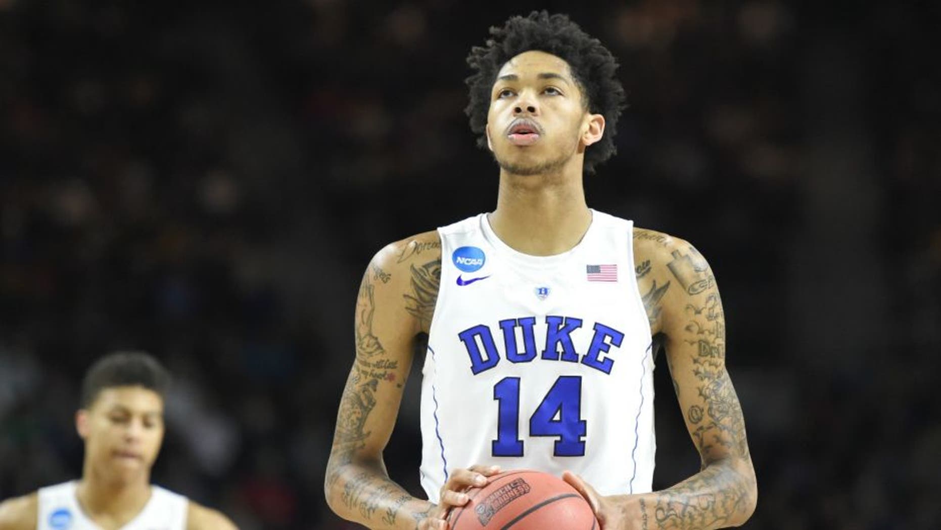 PROVIDENCE, RI - MARCH 19: Brandon Ingram #14 of the Duke Blue Devils takes a foul shot during a first round NCAA College Basketball Tournament game against the Yale Bulldogs at Dunkin' Donuts Center on March 19, 2016 in Providence, Rhode Island. The Blue Devils won 71-64. (Photo by Mitchell Layton/Getty Images)