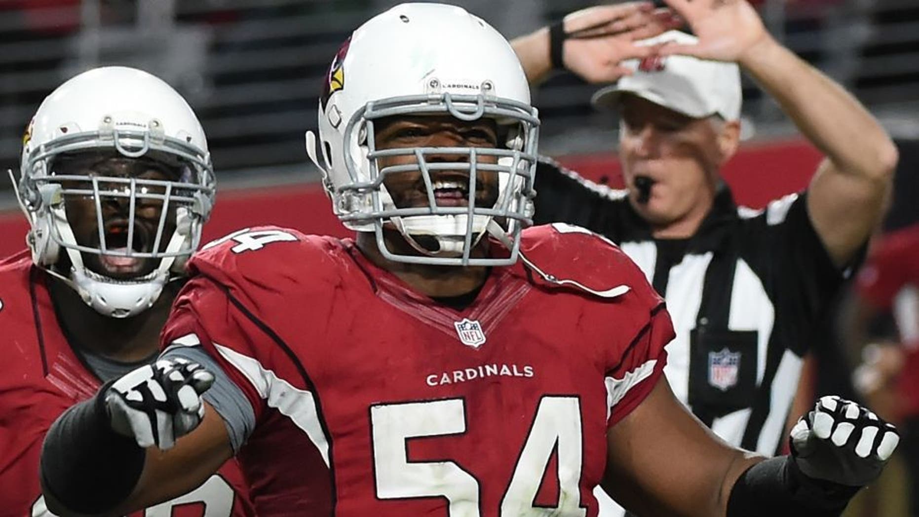 against the Green Bay Packers at University of Phoenix Stadium on December 27, 2015 in Glendale, Arizona.,GLENDALE, AZ - DECEMBER 27: Linebacker Dwight Freeney #54 and defensive end Frostee Rucker #92 of the Arizona Cardinals celebrate after a play during the NFL game against the Green Bay Packers at University of Phoenix Stadium on December 27, 2015 in Glendale, Arizona. (Photo by Norm Hall/Getty Images)
