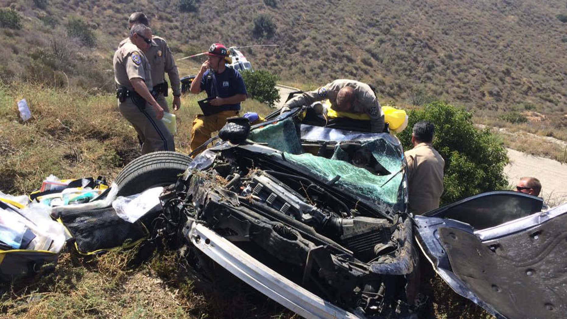 Woman spends 14 hours trapped in her car after wreck on California