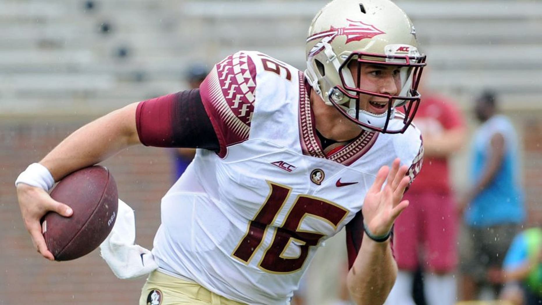 Apr 11, 2015; Tallahassee, FL, USA; Florida State Seminoles quarterback J.J. Cosentino (16) runs the ball during the spring game at Doak Campbell Stadium. Mandatory Credit: Melina Vastola-USA TODAY Sports