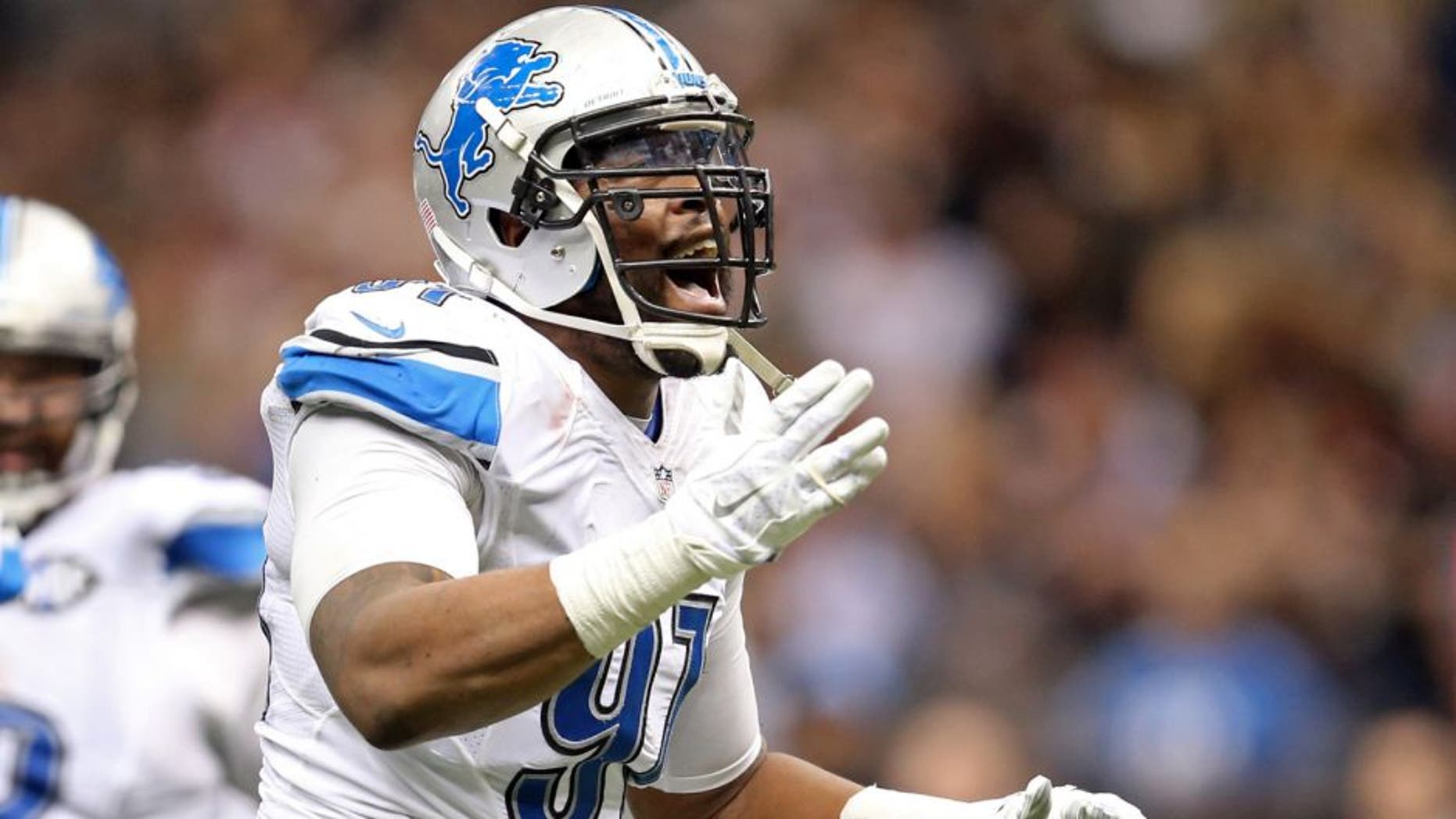 Dec 21, 2015; New Orleans, LA, USA; Detroit Lions defensive end Jason Jones (91) celebrates a sack against the New Orleans Saints in the third quarter of the game at the Mercedes-Benz Superdome. Mandatory Credit: Chuck Cook-USA TODAY Sports