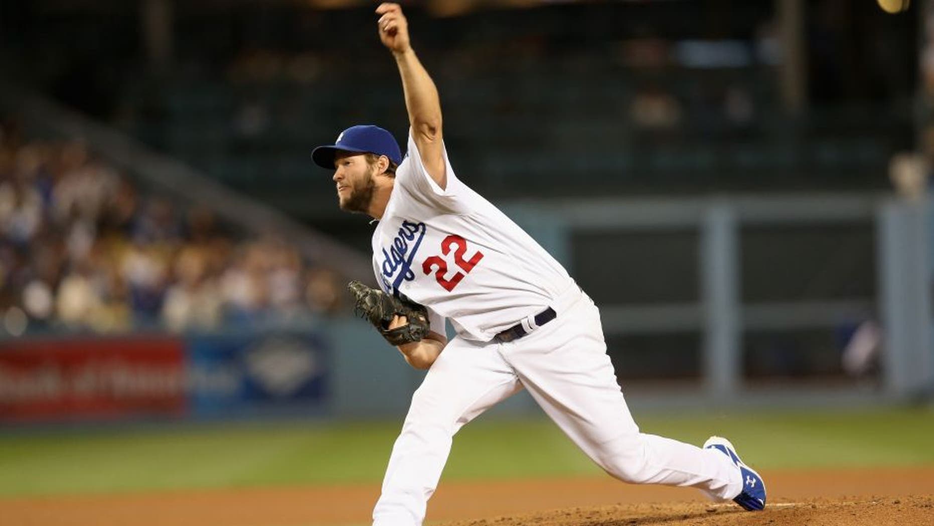 LOS ANGELES, CALIFORNIA - MAY 12: Clayton Kershaw #22 of the Los Angeles Dodgers throws a pitch against the New York Mets at Dodger Stadium on May 12, 2016 in Los Angeles, California. Kershaw threw a complete game shutout with 13 strikeouts as the Dodgers won 5-0. (Photo by Stephen Dunn/Getty Images)