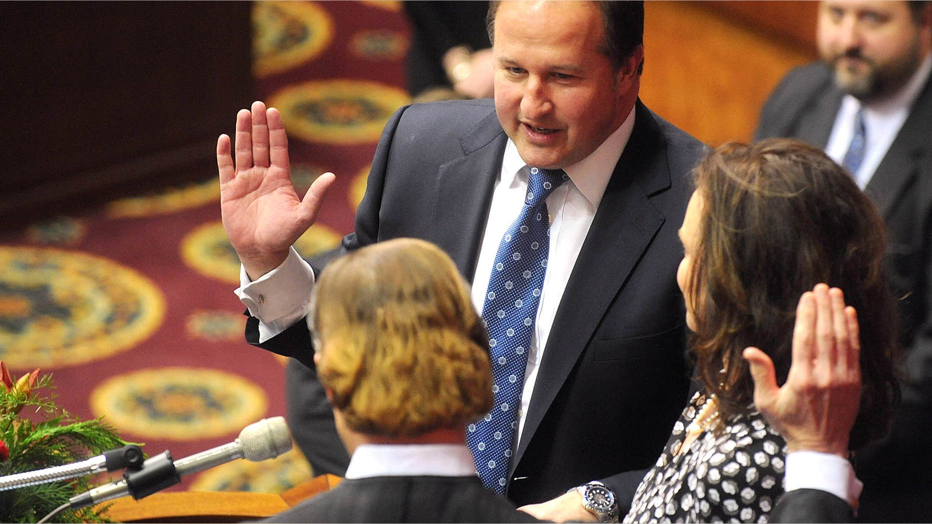 Jan. 7, 2015: In this file photo, John J. Diehl Jr., center, is sworn in as the Speaker Pro Tem of the House of Representatives during the opening of the Missouri legislature in Jefferson City, Mo.