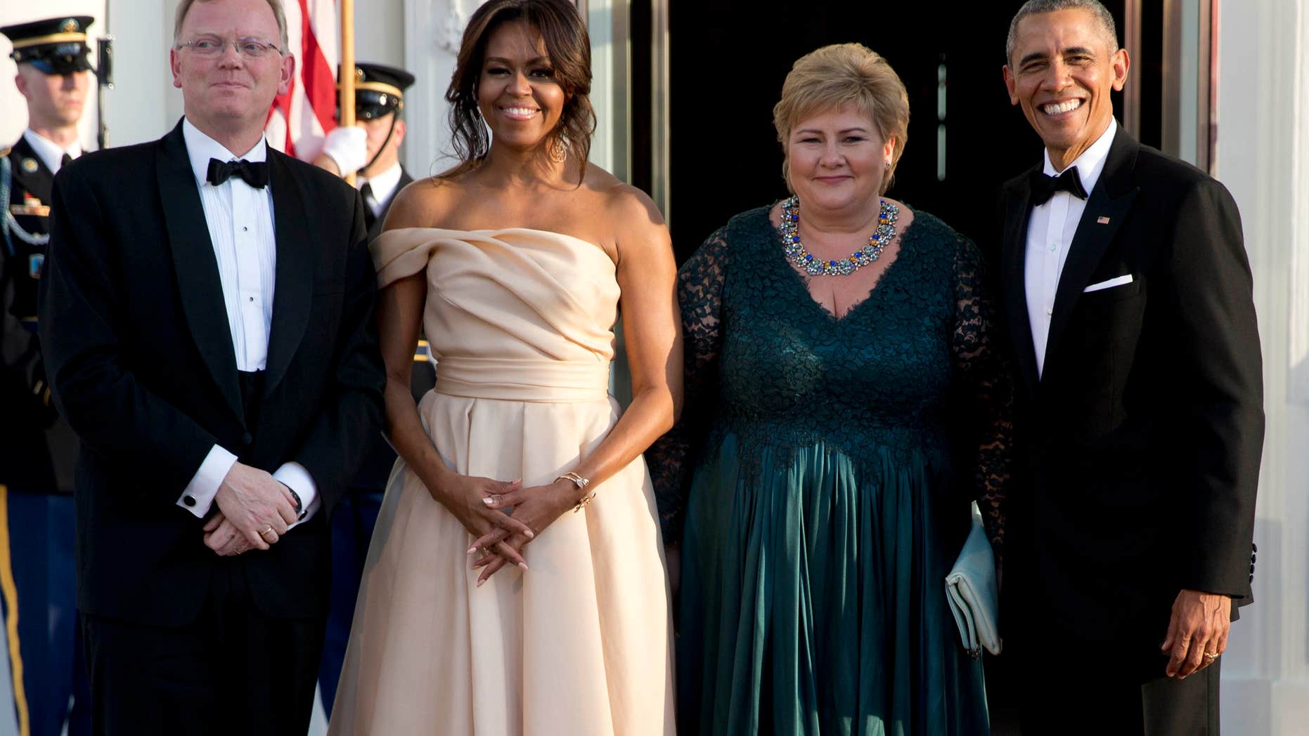 May 13, 2016: President Barack Obama and first lady Michelle Obama stand with Norwegian Prime Minister Erna Solberg and her husband Sindre Finnes as they arrive at the North Portico of the White House in Washington.