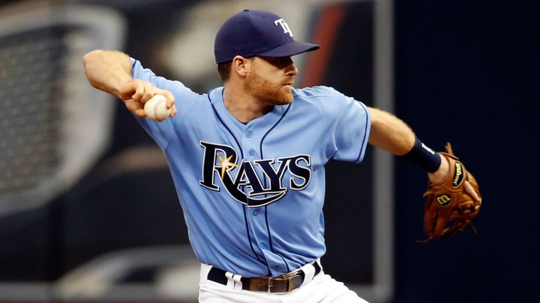 May 1, 2016; St. Petersburg, FL, USA; Tampa Bay Rays second baseman Logan Forsythe (11) throws the ball to first base for a double play against the Toronto Blue Jays at Tropicana Field. Mandatory Credit: Kim Klement-USA TODAY Sports