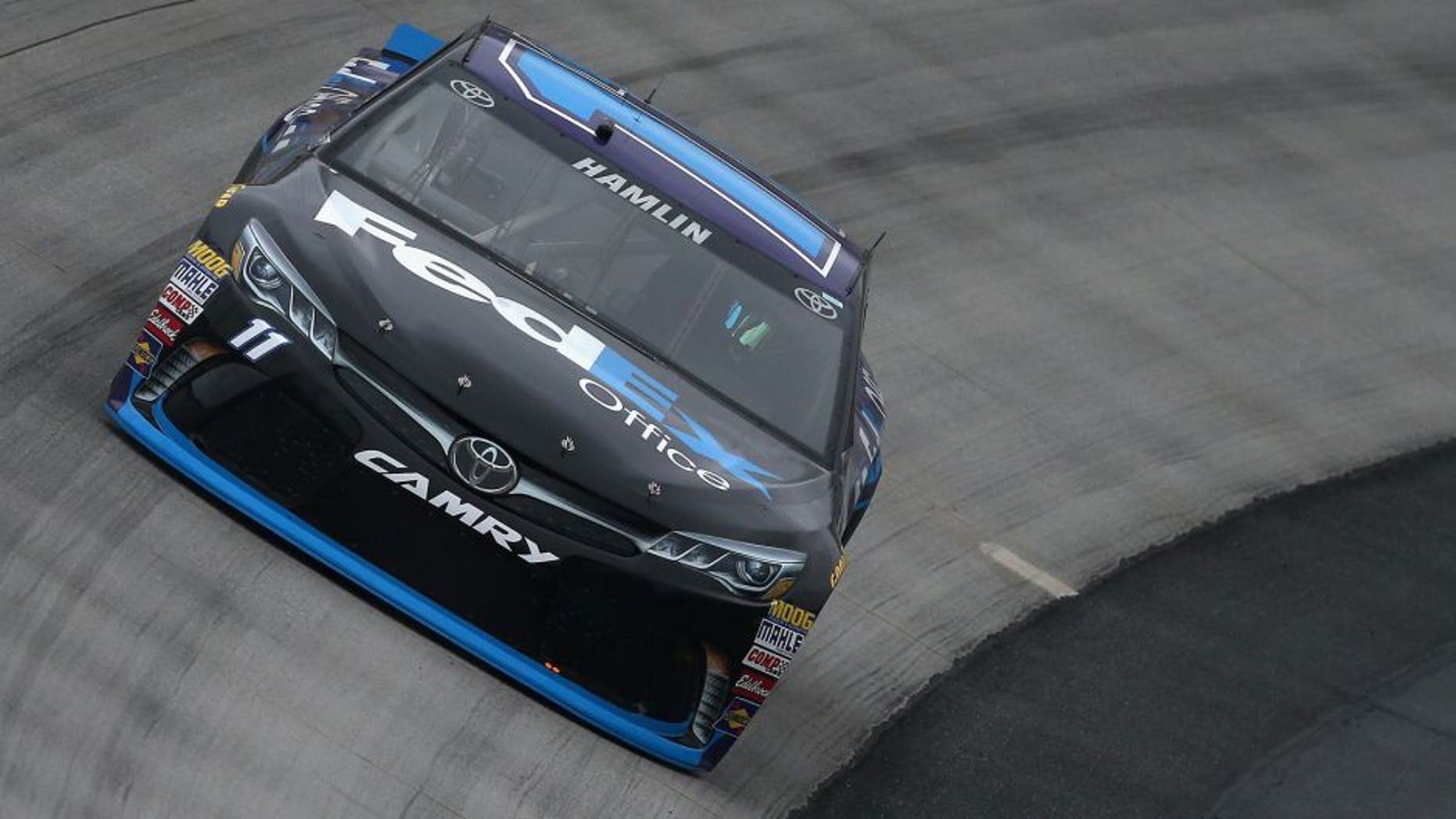 DOVER, DE - MAY 13: Denny Hamlin, driver of the #11 FedEx Office Toyota, practices for the NASCAR Sprint Cup Series AAA 400 Drive For Autism at Dover International Speedway on May 13, 2016 in Dover, Delaware. (Photo by Sean Gardner/Getty Images)