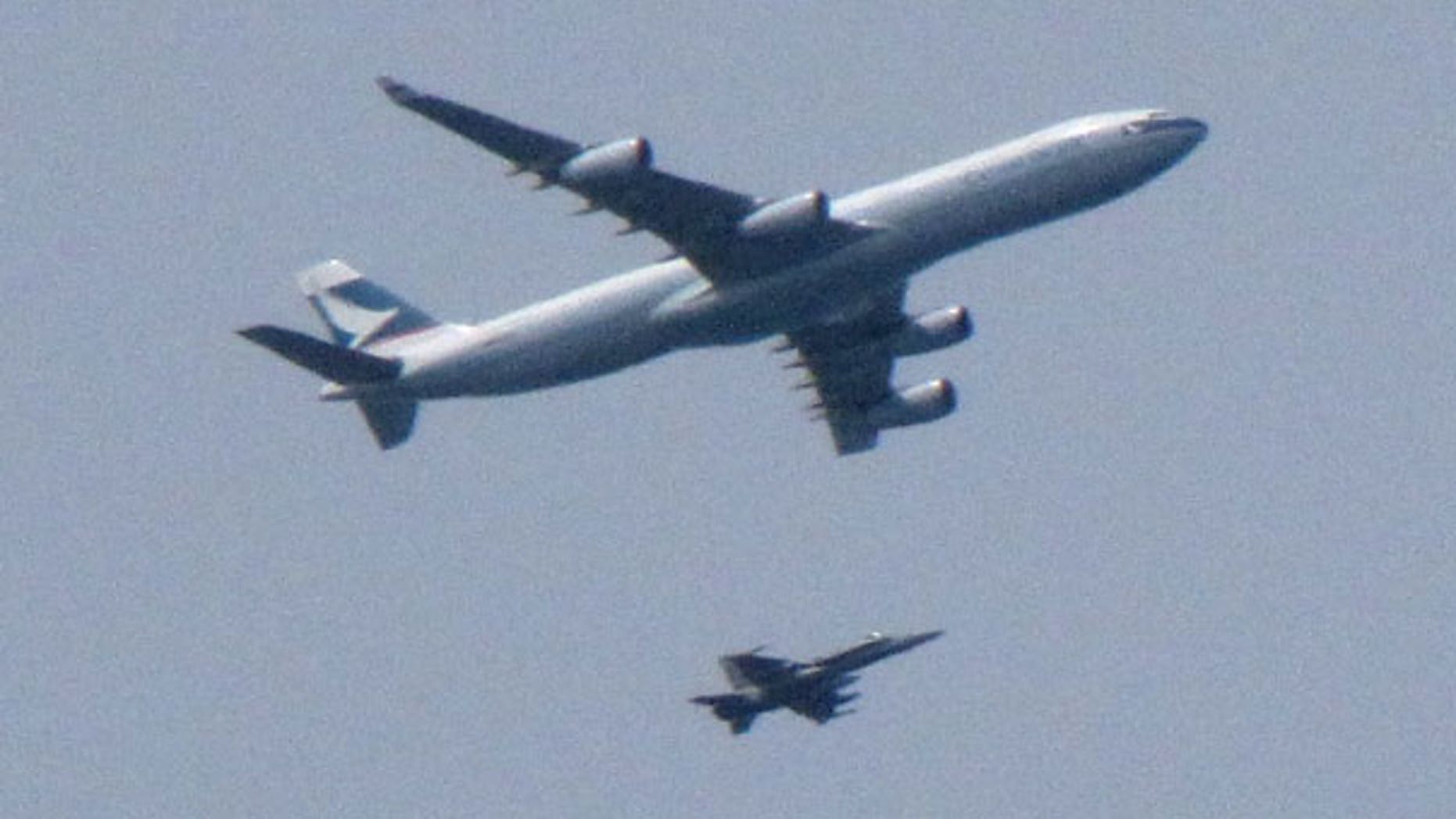 May 15: An F-18 Hornet fighter jet intercepts a Cathay Pacific passenger plane headed for Vancouver, Canada.