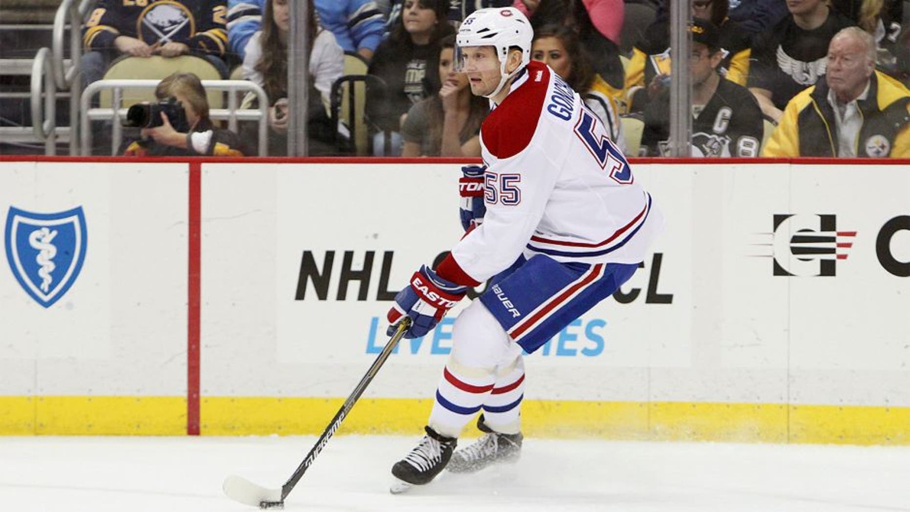 Jan 3, 2015; Pittsburgh, PA, USA; Montreal Canadiens defensemen Sergei Gonchar (55) handles the puck against the Pittsburgh Penguins during the first period at the Consol Energy Center. Canadiens defeated the Penguins 4-1. Mandatory Credit: Matthew O'Haren-USA TODAY Sports
