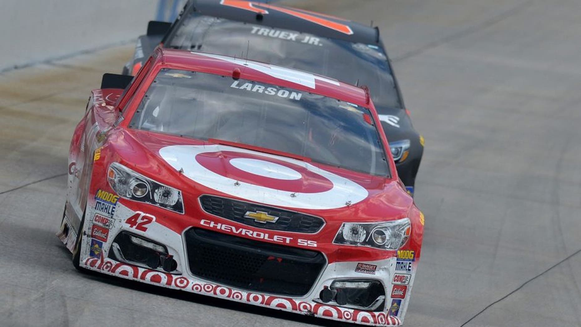 DOVER, DE - MAY 15: Kyle Larson, driver of the #42 Target Chevrolet, leads Martin Truex Jr, driver of the #78 Furniture Row Toyota, during the NASCAR Sprint Cup Series AAA 400 Drive for Autism at Dover International Speedway on May 15, 2016 in Dover, Delaware. (Photo by Drew Hallowell/NASCAR via Getty Images)