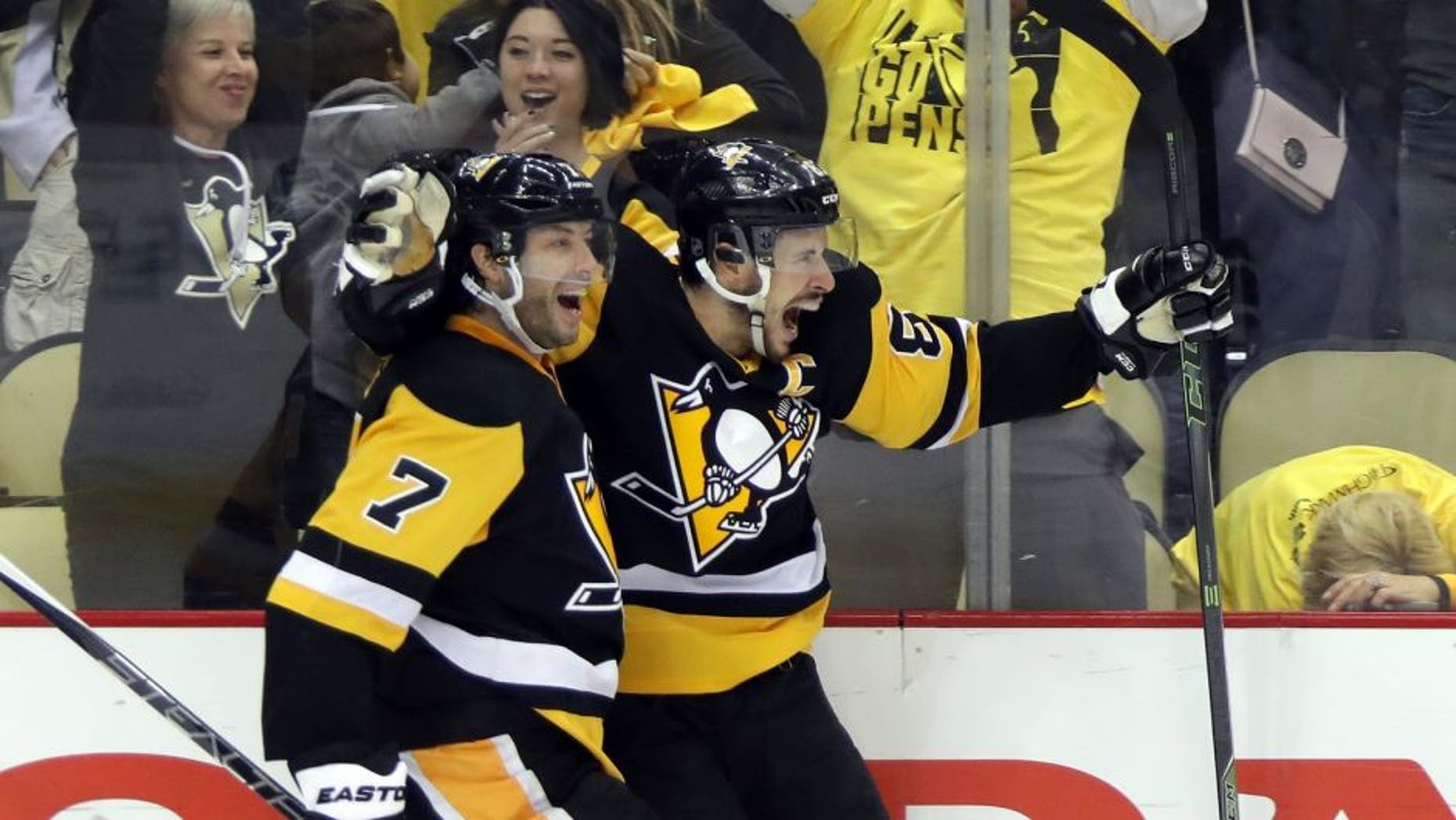 PITTSBURGH, PA - MAY 16: Sidney Crosby #87 of the Pittsburgh Penguins celebrates with teammate Matt Cullen #7 after scoring a goal in overtime against Andrei Vasilevskiy #88 of the Tampa Bay Lightning to win Game Two of the Eastern Conference Final with a score of 3 to 2 during the 2016 NHL Stanley Cup Playoffs at the Consol Energy Center on May 16, 2016 in Pittsburgh, Pennsylvania. (Photo by Bruce Bennett/Getty Images)