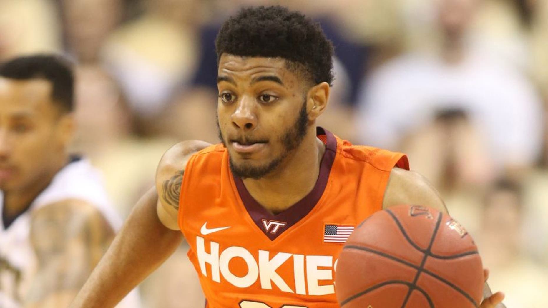 Jan 31, 2016; Pittsburgh, PA, USA; Virginia Tech Hokies guard Jalen Hudson (23) dribbles the ball against the Pittsburgh Panthers during the second half at the Petersen Events Center. PITT won 90-71. Mandatory Credit: Charles LeClaire-USA TODAY Sports