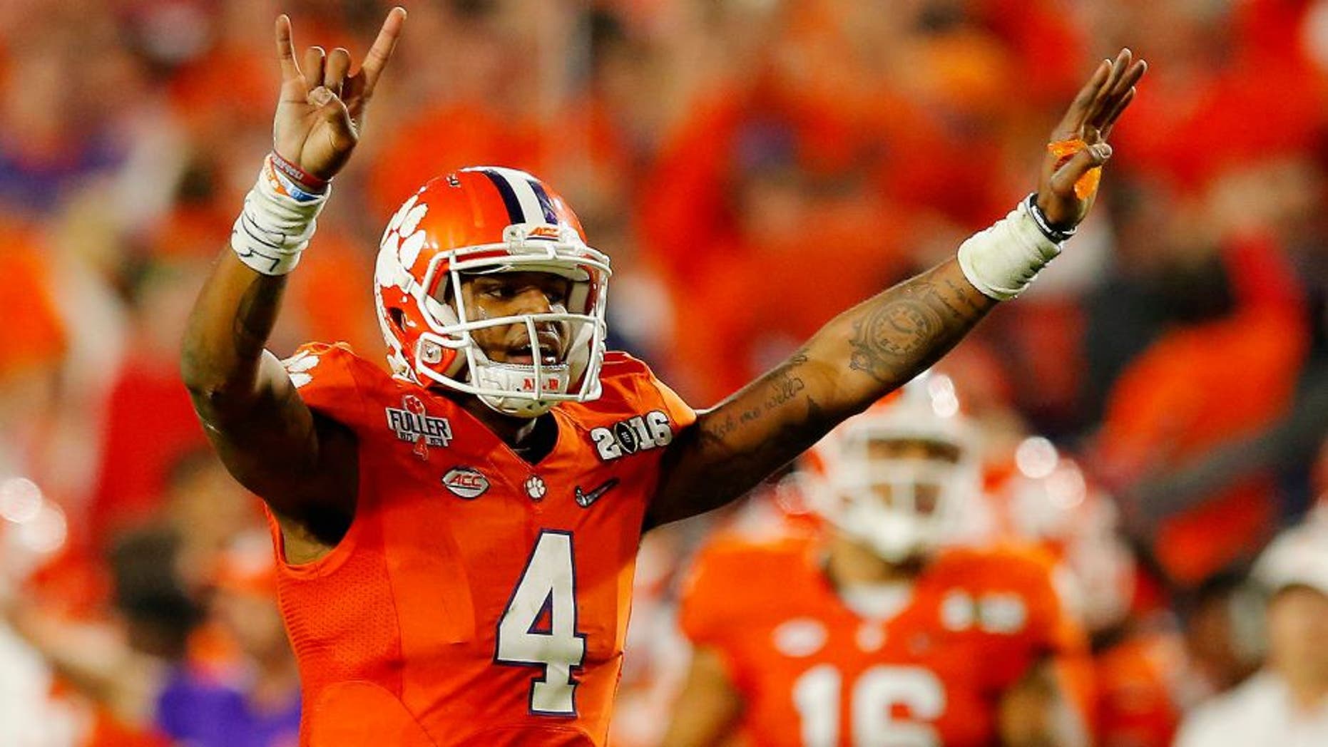 GLENDALE, AZ - JANUARY 11: Deshaun Watson #4 of the Clemson Tigers reacts against the Alabama Crimson Tide during the 2016 College Football Playoff National Championship Game at University of Phoenix Stadium on January 11, 2016 in Glendale, Arizona. (Photo by Kevin C. Cox/Getty Images)