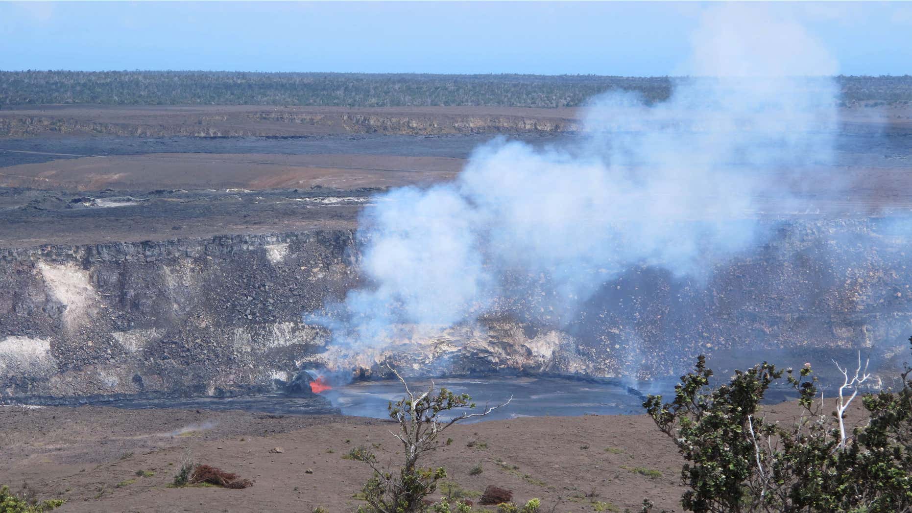 May 9, 2015: Molten rock spews into a lake of lava near the summit of Kilauea volcano on Hawaii's Big Island.