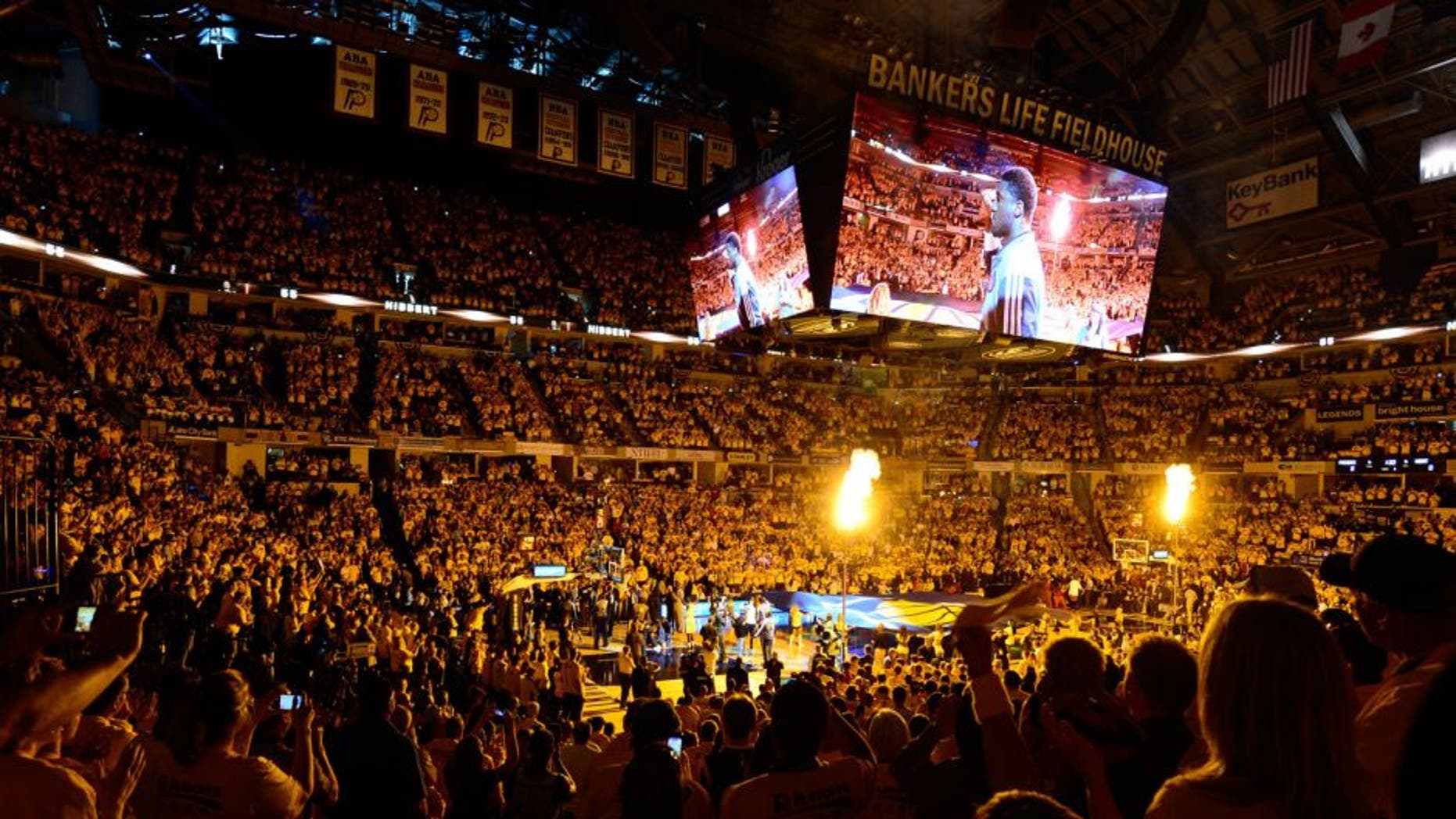 May 18, 2014; Indianapolis, IN, USA; The Indiana Pacers are introduced before game one of the Eastern Conference Finals of the 2014 NBA Playoffs against the Miami Heat at Bankers Life Fieldhouse. Mandatory Credit: Marc Lebryk-USA TODAY Sports
