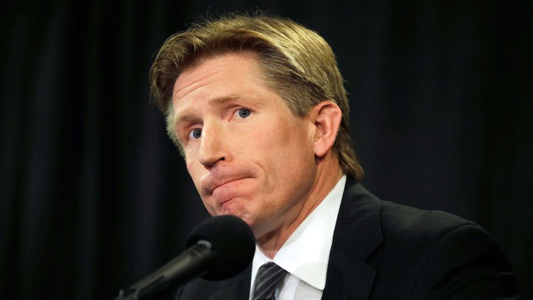 Philadelphia Flyers newly-hired head coach Dave Hakstol listens to a reporter's question during a news conference, Monday, May 18, 2015, in Philadelphia. (AP Photo/Matt Slocum)