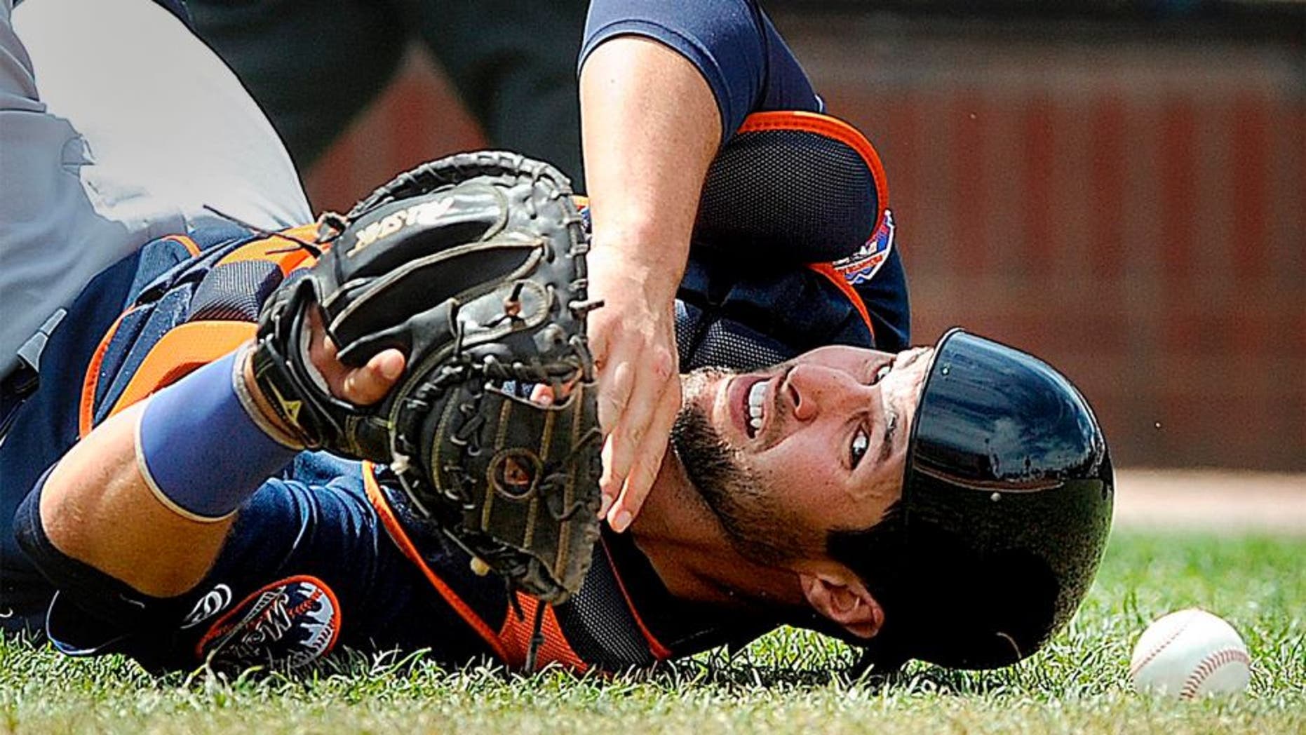 PORTLAND, ME - MAY 14: Colton Plaia of the Binghamton Mets looks back for the baseball after falling to the ground and failing to make a catch on a pop up behind home plate Saturday, May 14, 2016. (Photo by Gabe Souza/Portland Press Herald via Getty Images)
