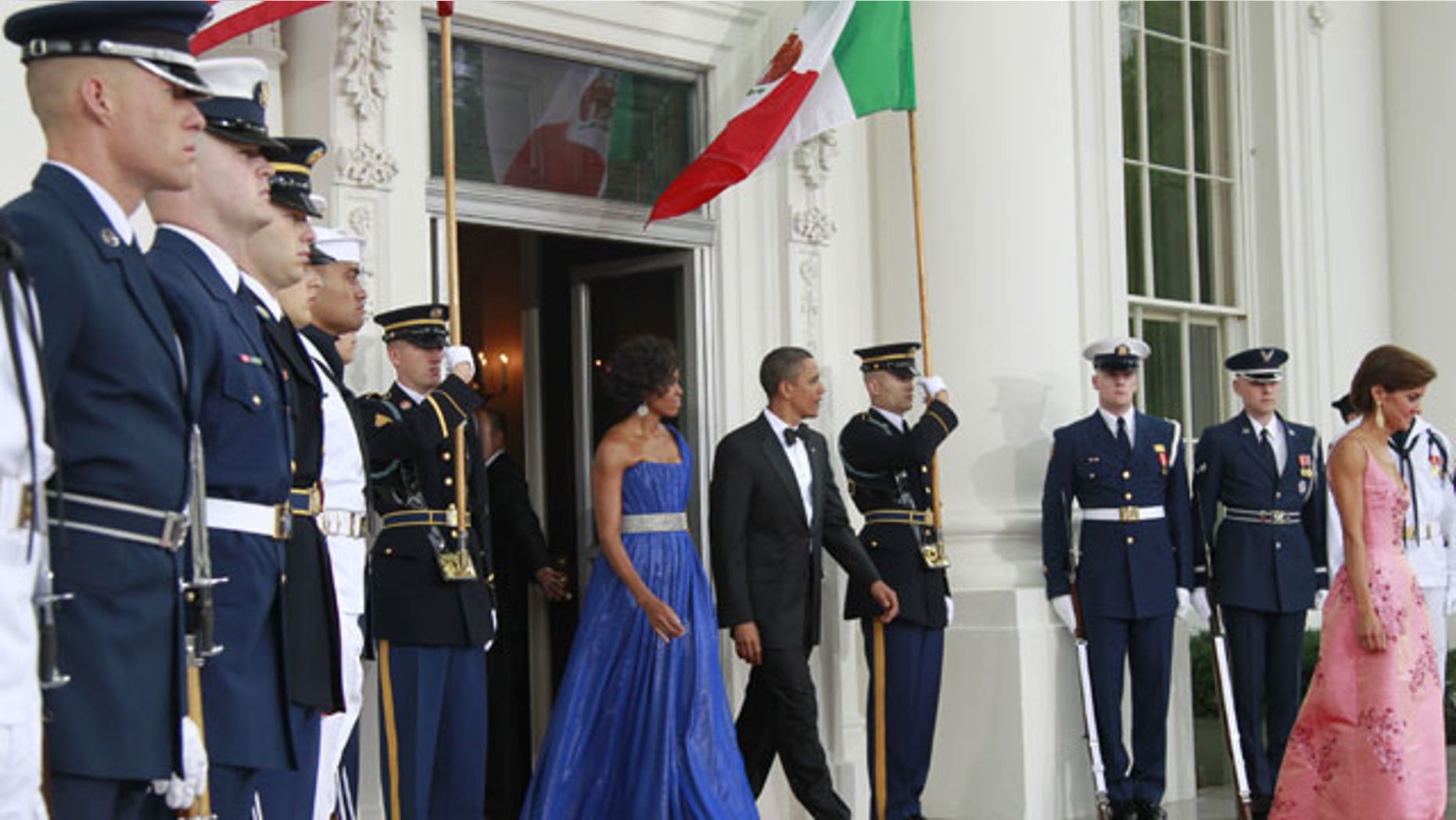 May 19: President Obama and first lady Michelle Obama walk out on the North Portico of the White House to welcome Mexican President Felipe Calderon and Mexico's first lady Margarita Zavala for the State Dinner at the White House in Washington.
