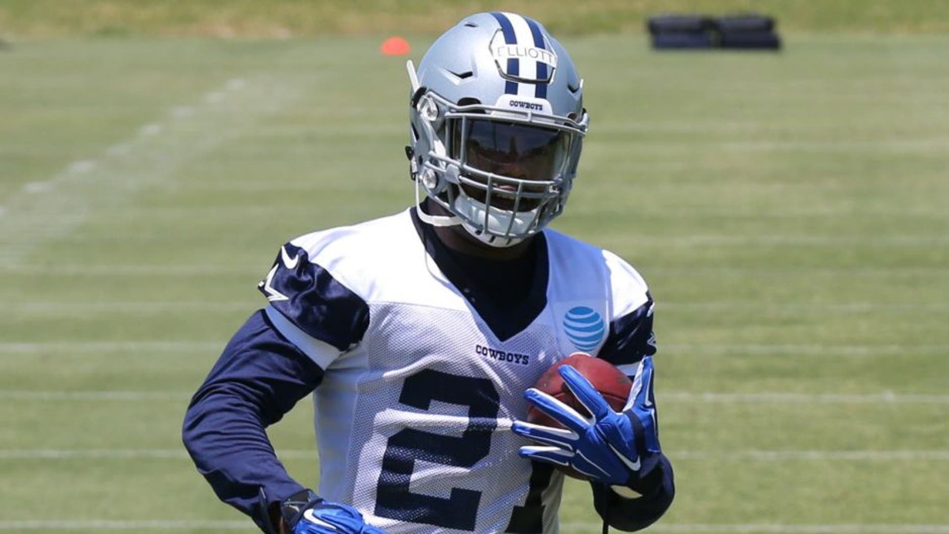 May 6, 2016; Irving, TX, USA; Dallas Cowboys number one draft pick Ezekiel Elliott (21) runs with that ball during rookie minicamp at Dallas Cowboys headquarters at Valley Ranch. Mandatory Credit: Matthew Emmons-USA TODAY Sports