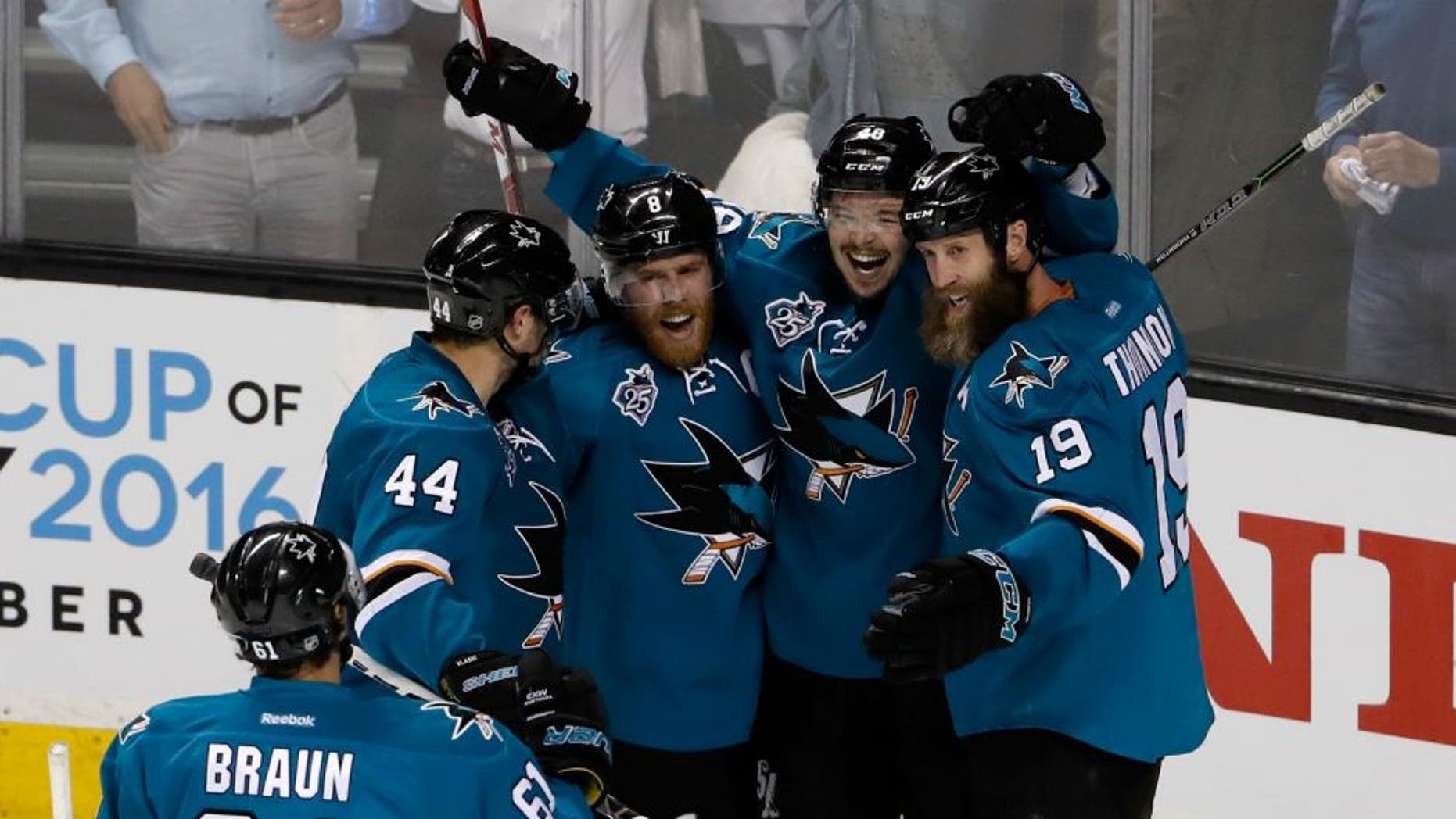 SAN JOSE, CA - MAY 19: (2nd R) Tomas Hertl #48 of the San Jose Sharks celebrates with Justin Braun #61, Marc-Edouard Vlasic #44, Joe Pavelski #8 and Joe Thornton #19 after his second goal in game three of the Western Conference Finals against the St. Louis Blues during the 2016 NHL Stanley Cup Playoffs at SAP Center on May 19, 2016 in San Jose, California. (Photo by Christian Petersen/Getty Images)