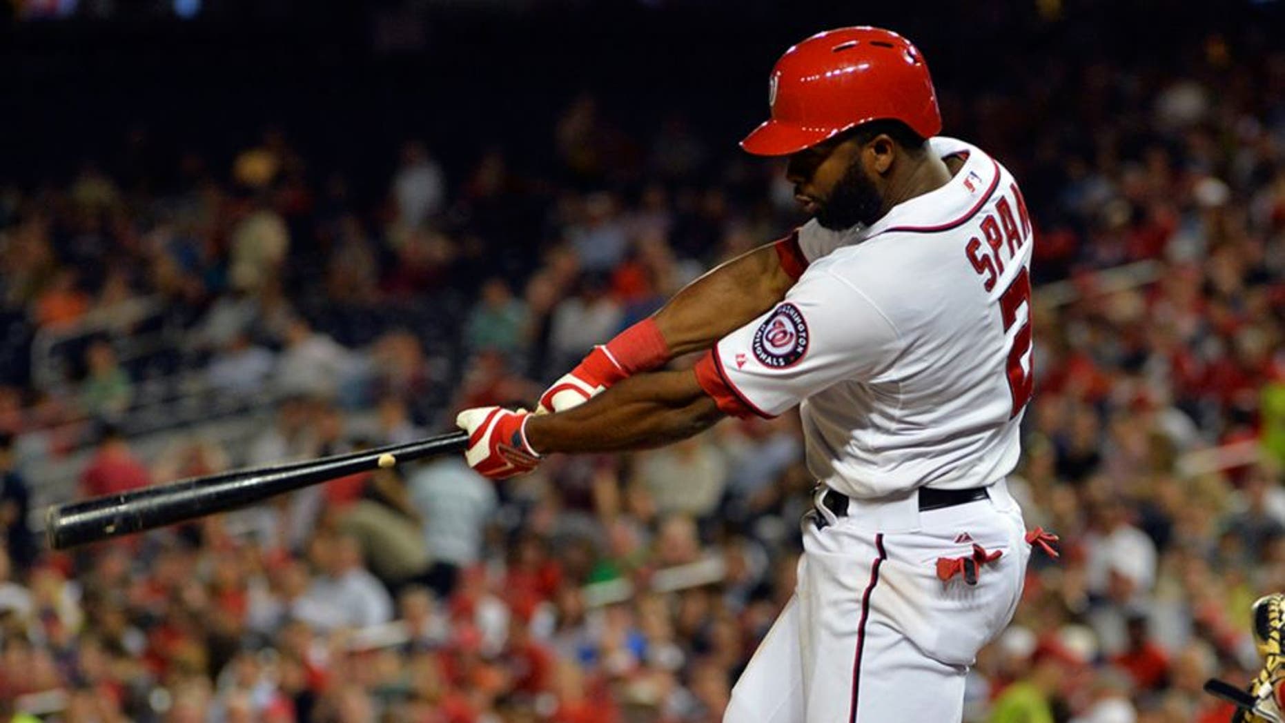 May 20, 2014; Washington, DC, USA; Washington Nationals center fielder Denard Span (2) singles in the sixth inning against the Cincinnati Reds at Nationals Park. Washington Nationals defeated Cincinnati Reds 9-4. Mandatory Credit: Tommy Gilligan-USA TODAY Sports