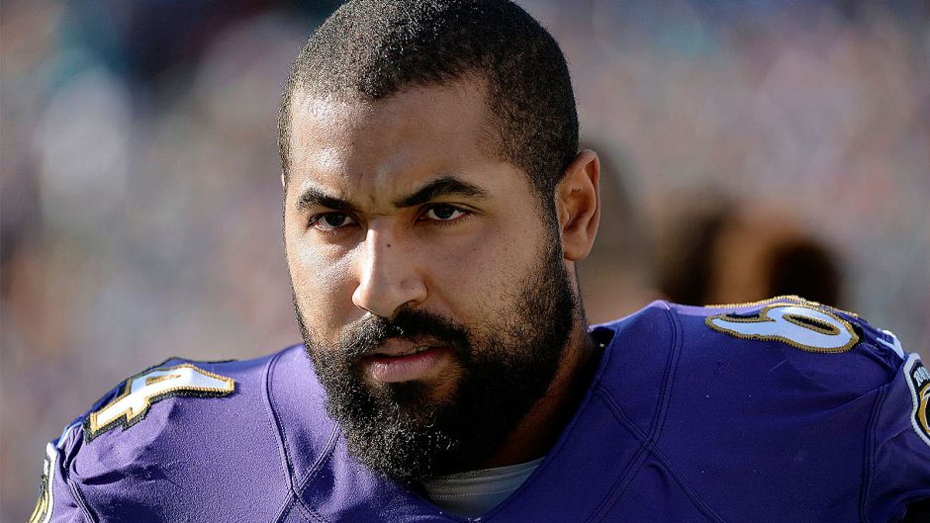 Dec 7, 2014; Miami Gardens, FL, USA; Baltimore Ravens guard John Urschel (64) during the second half against the Miami Dolphins at Sun Life Stadium. Ravens won 28-13. Mandatory Credit: Steve Mitchell-USA TODAY Sports