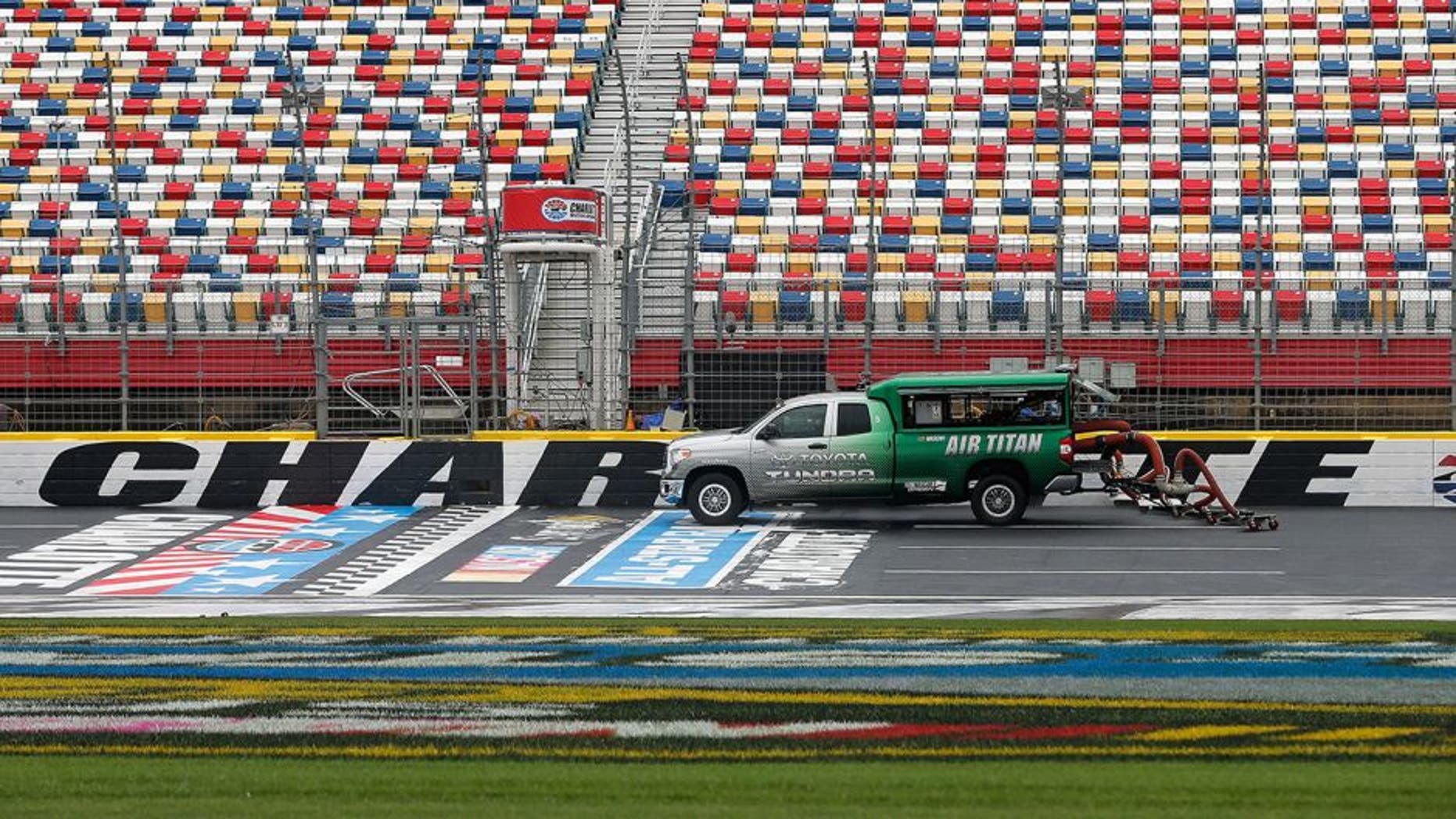 CHARLOTTE, NC - MAY 20: An Air Titan 2.0 truck works to dry the track prior to practice for the NASCAR Sprint Cup Series Sprint Showdown at Charlotte Motor Speedway on May 20, 2016 in Charlotte, North Carolina. (Photo by Brian Lawdermilk/Getty Images)