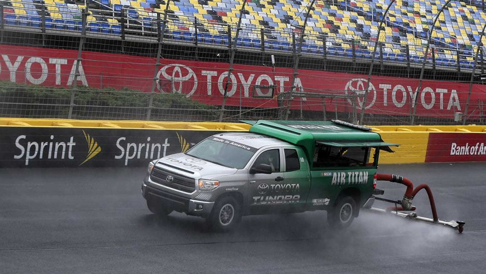 CHARLOTTE, NC - MAY 19: An Air Titan 2.0 works to dry the track prior to practice for the NASCAR Camping World Truck Series North Carolina Education Lottery 200 at Charlotte Motor Speedway on May 19, 2016 in Charlotte, North Carolina. (Photo by Matt Sullivan/NASCAR via Getty Images)